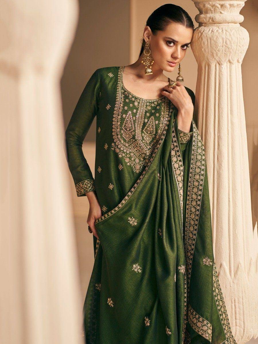 Emerald green embroidered salwar kameez with gold detailing, perfect for Indian ethnic wear occasions