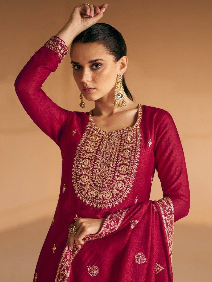 Maroon ethnic salwar kameez with gold embroidery, perfect for Indian festive occasions