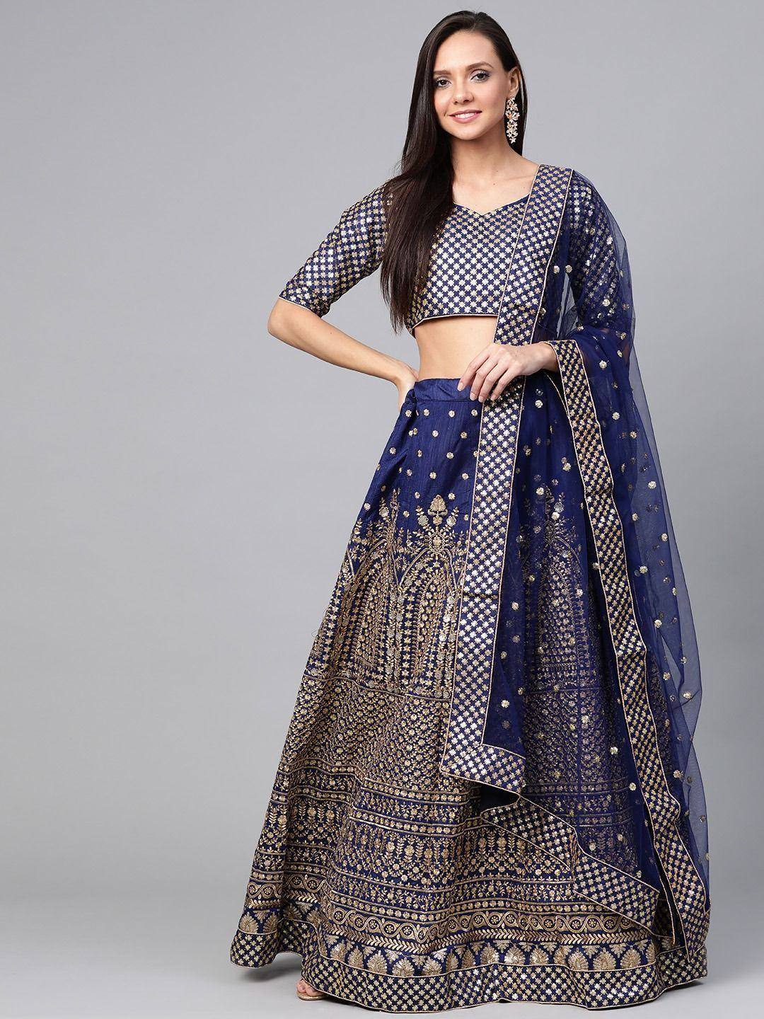 Navy blue lehenga choli with gold embroidery, perfect for Indian weddings and festive occasions