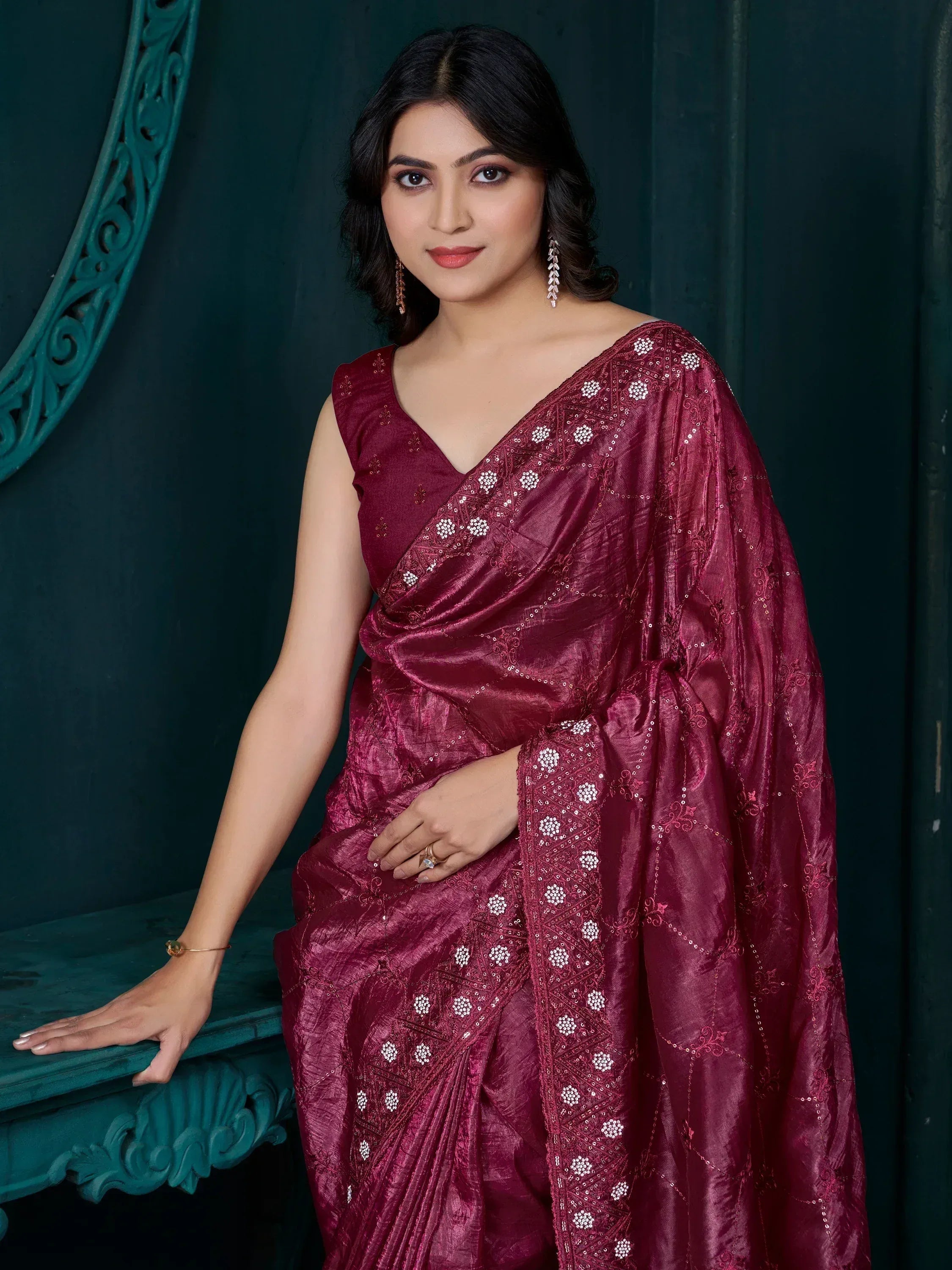 Elegant maroon saree with white floral embroidery, perfect for Indian ethnic wear occasions.