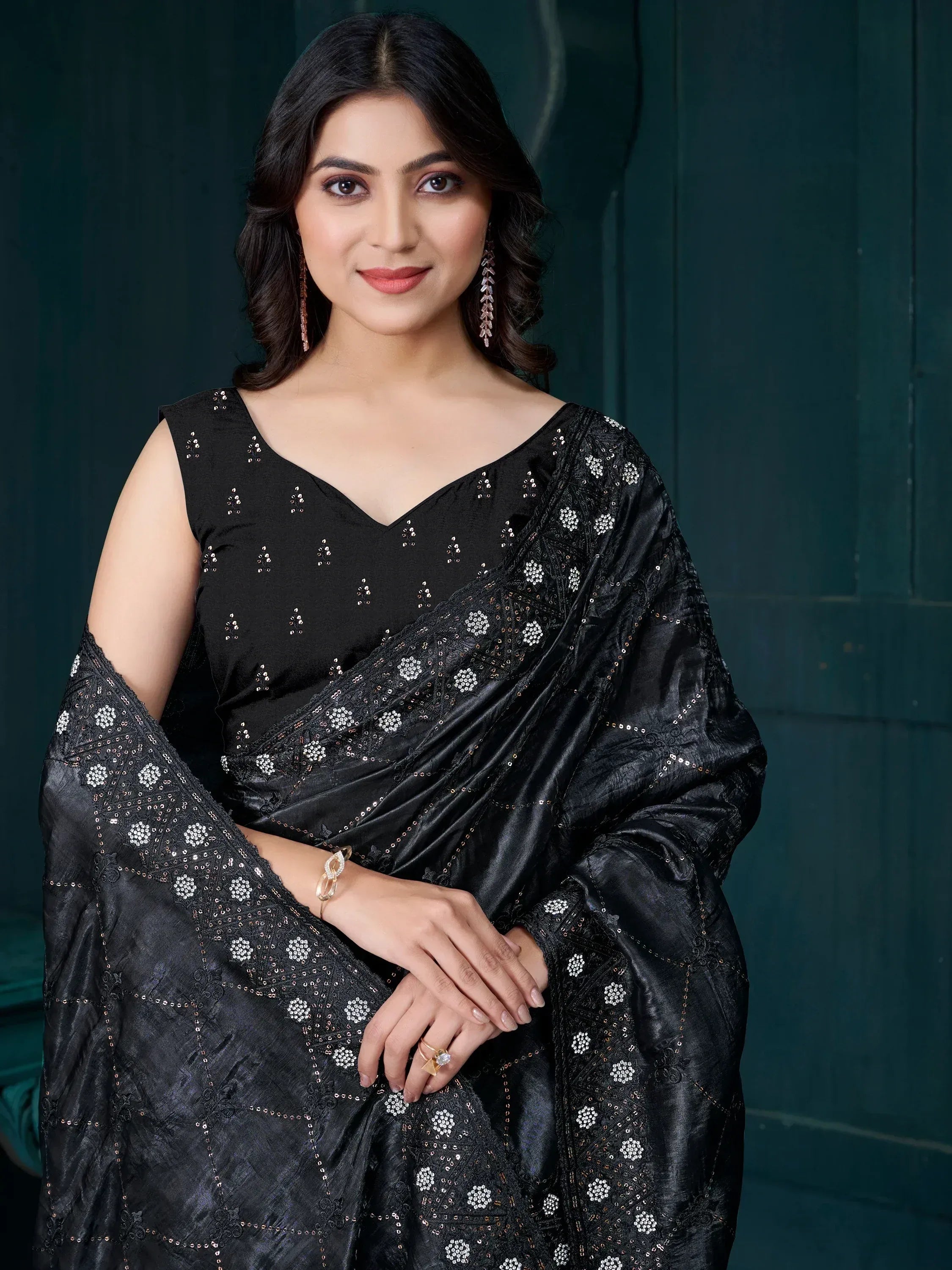 Elegant black saree with sequin floral embroidery, perfect for Indian ethnic occasions