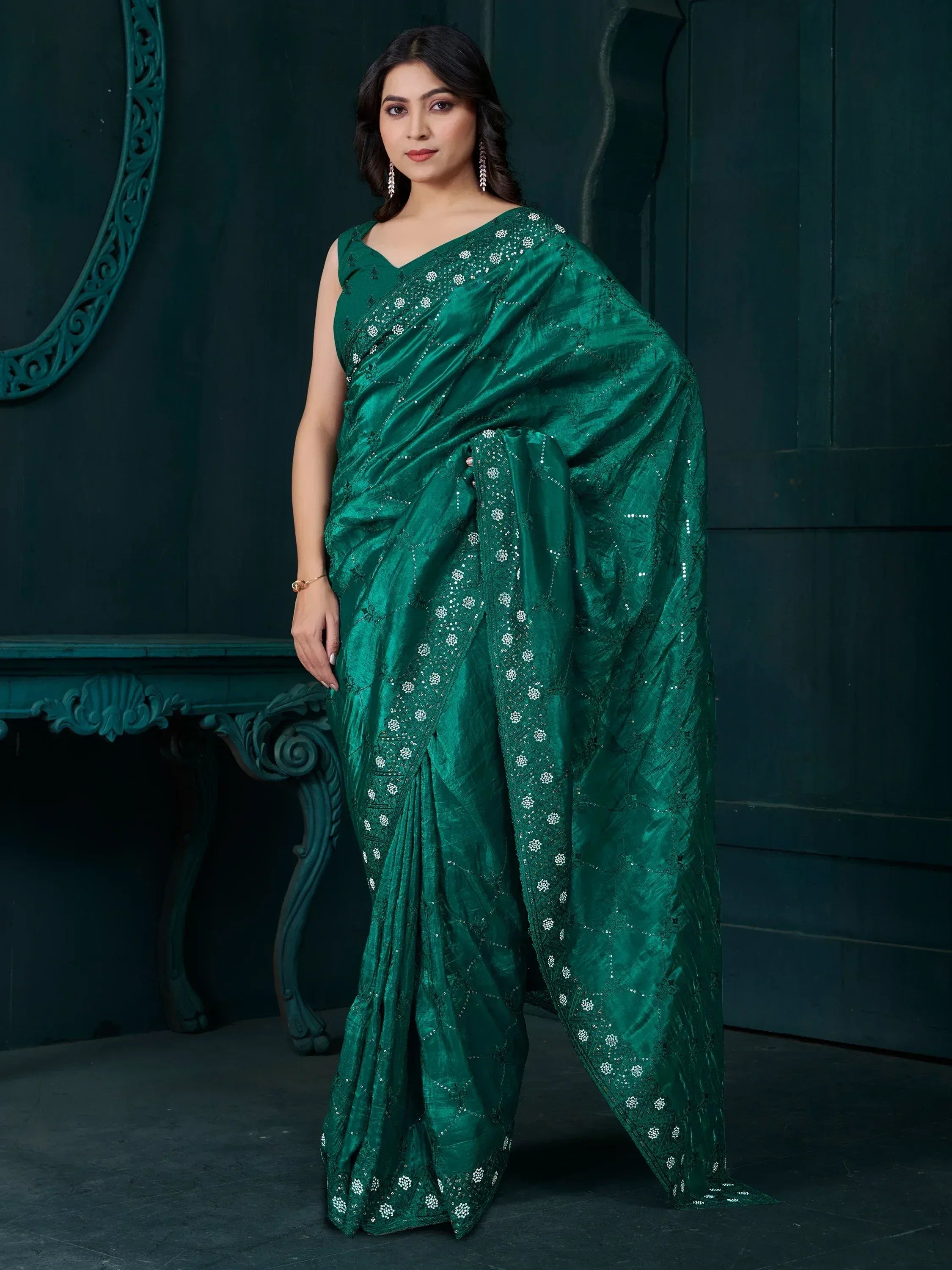 Emerald green embroidered saree with sequin detailing, perfect for Indian ethnic occasions