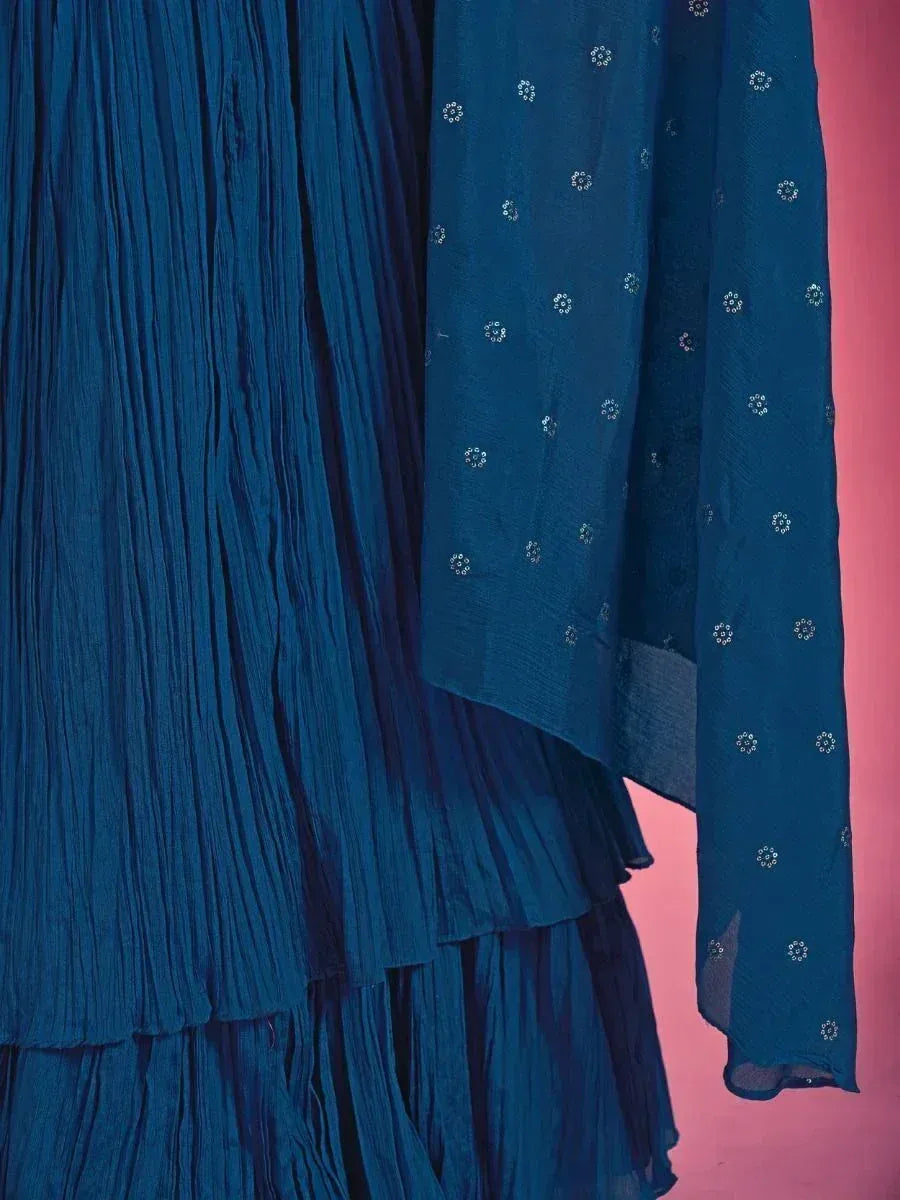 Blue pleated ethnic gown with floral embroidery, perfect for Indian festive wear