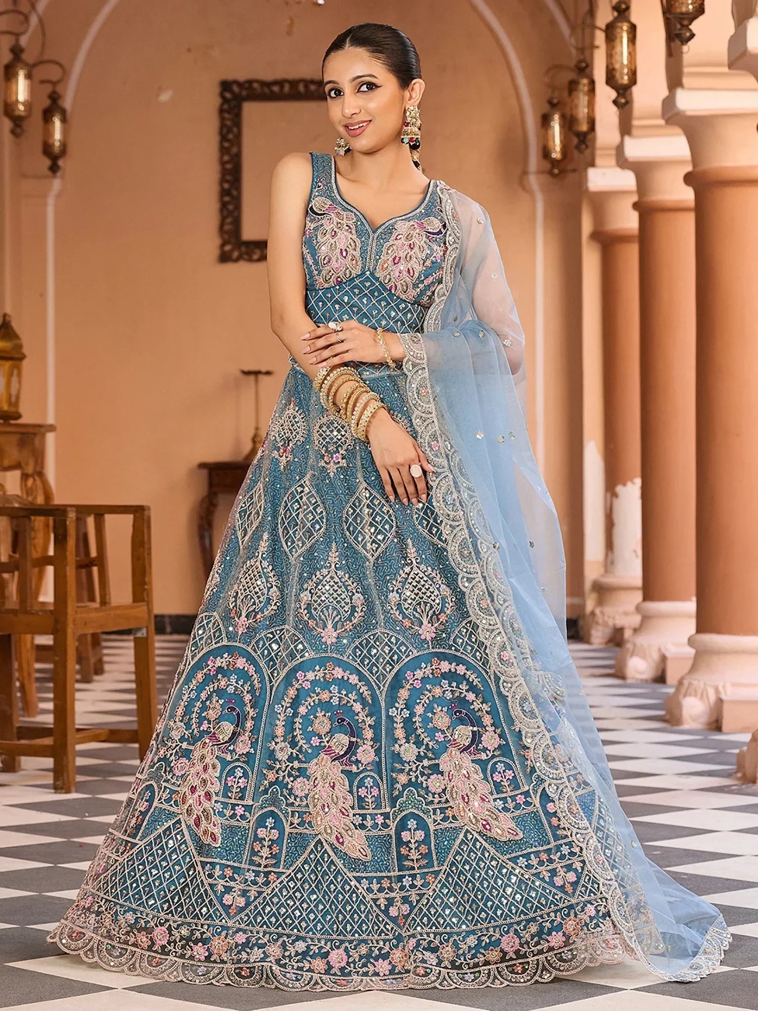 Charming Blue Thread Embroidered Net Engagement Wear Lehenga Choli
