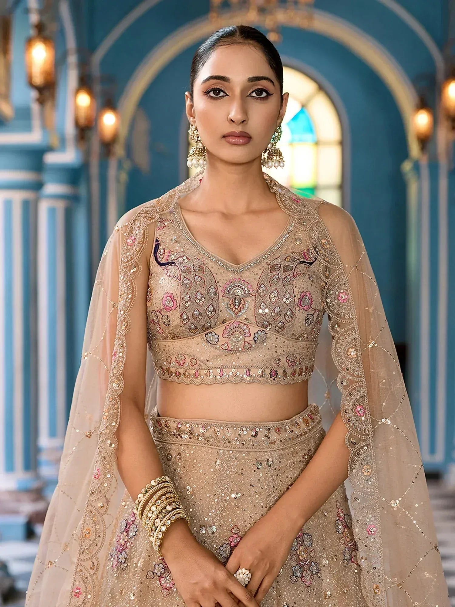 Fabulous Beige Embroidered Net Reception Wear Lehenga Choli