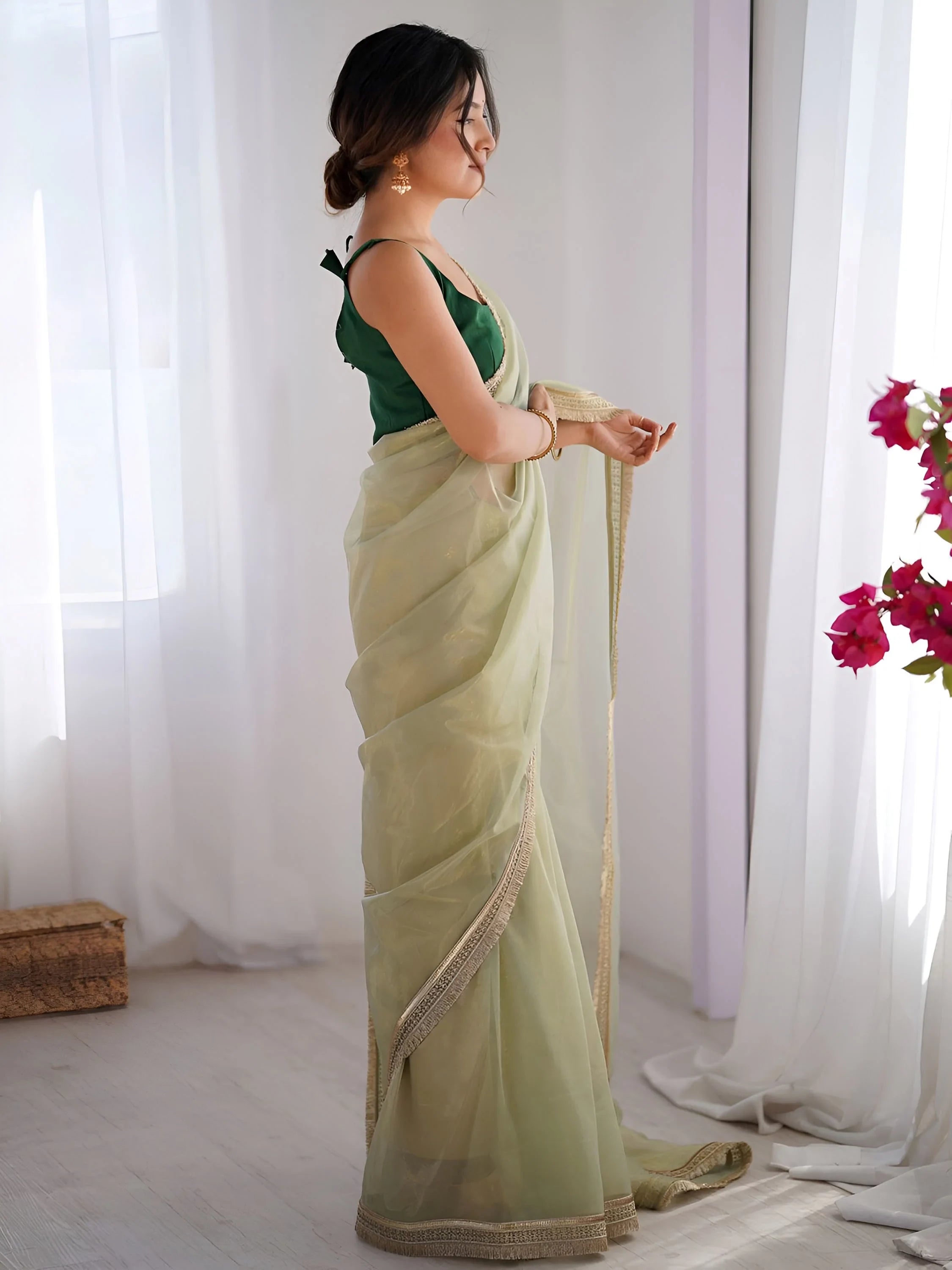 Charming Pista Green Net Engagement Wear Saree With Blouse