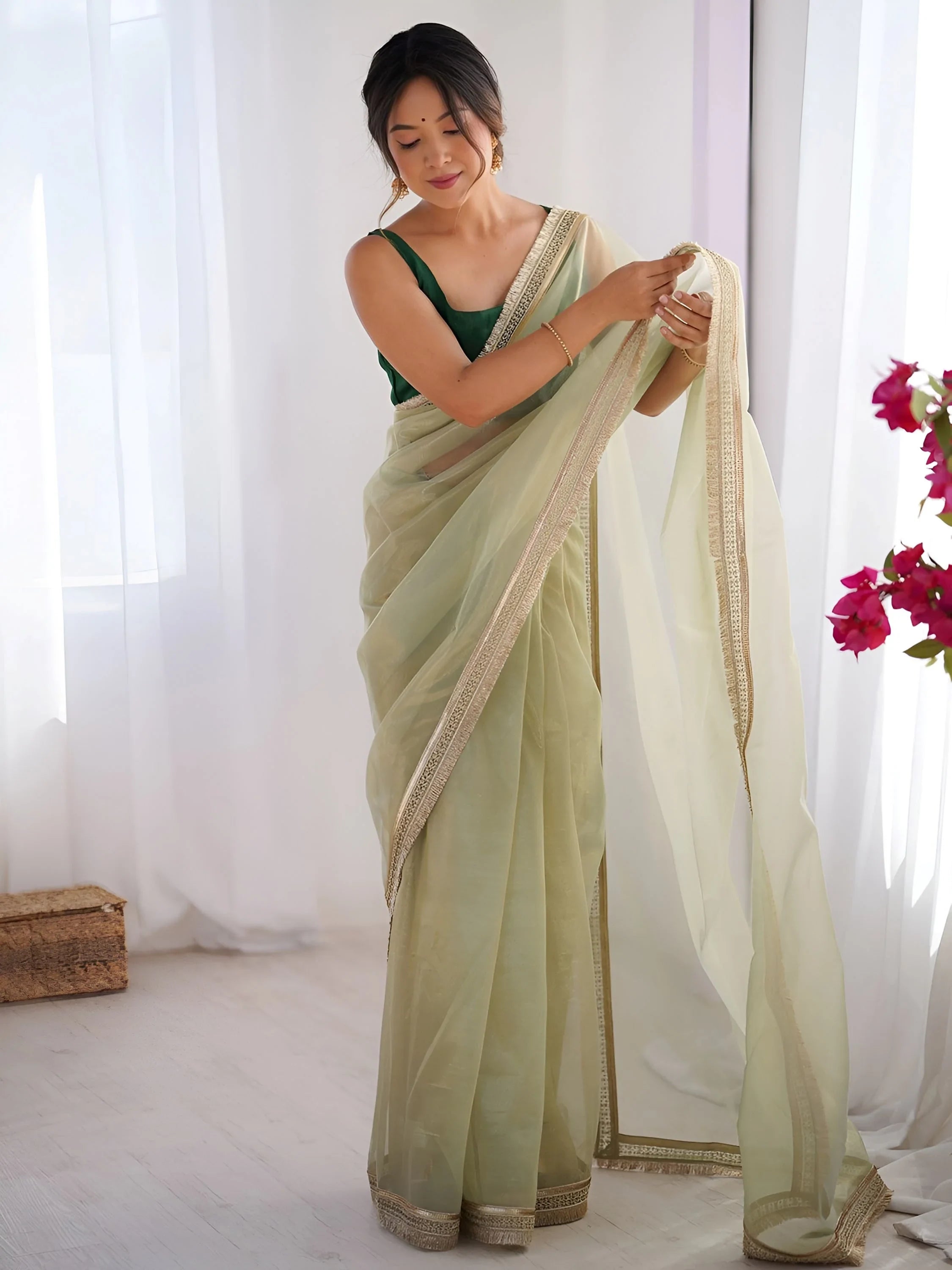 Charming Pista Green Net Engagement Wear Saree With Blouse