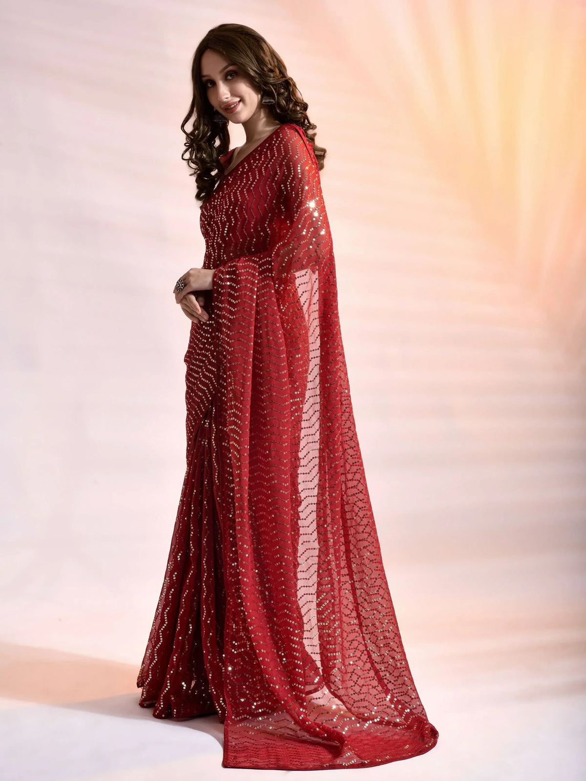 Red sequin ethnic gown with sheer overlay, perfect for Indian weddings and festive occasions