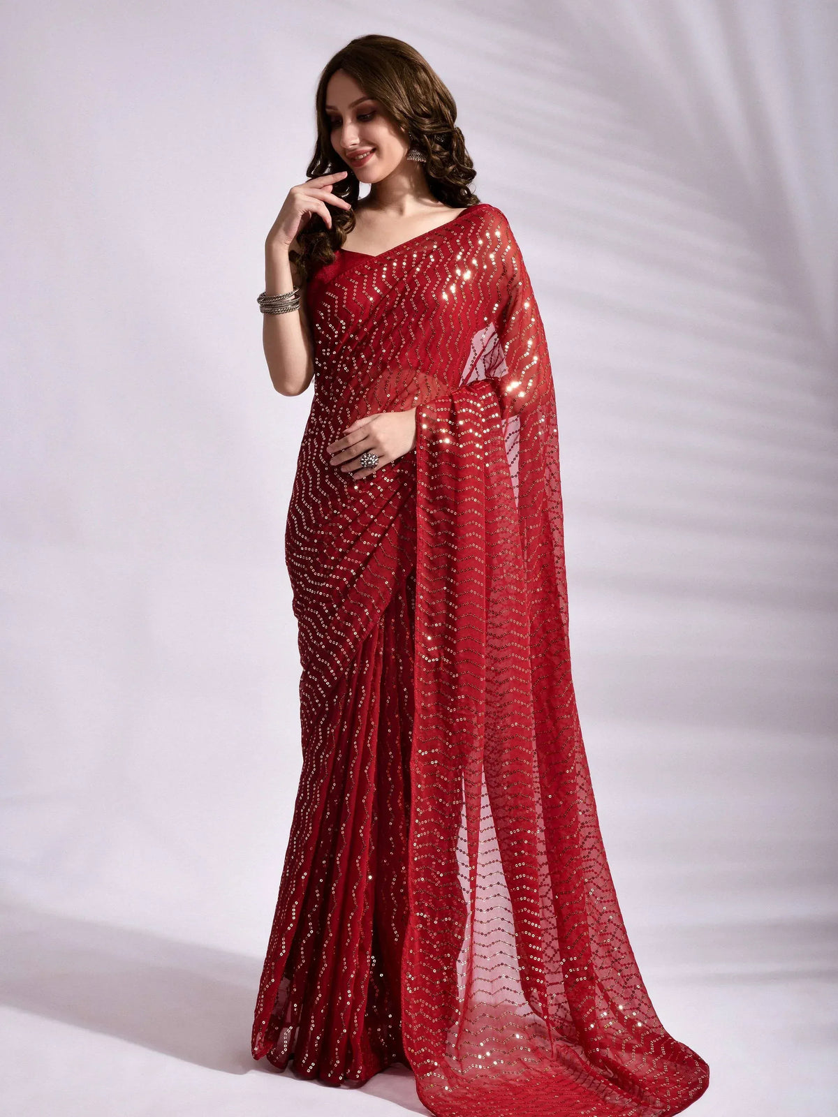 Red sequin saree with sheer overlay, elegant ethnic wear for weddings and parties