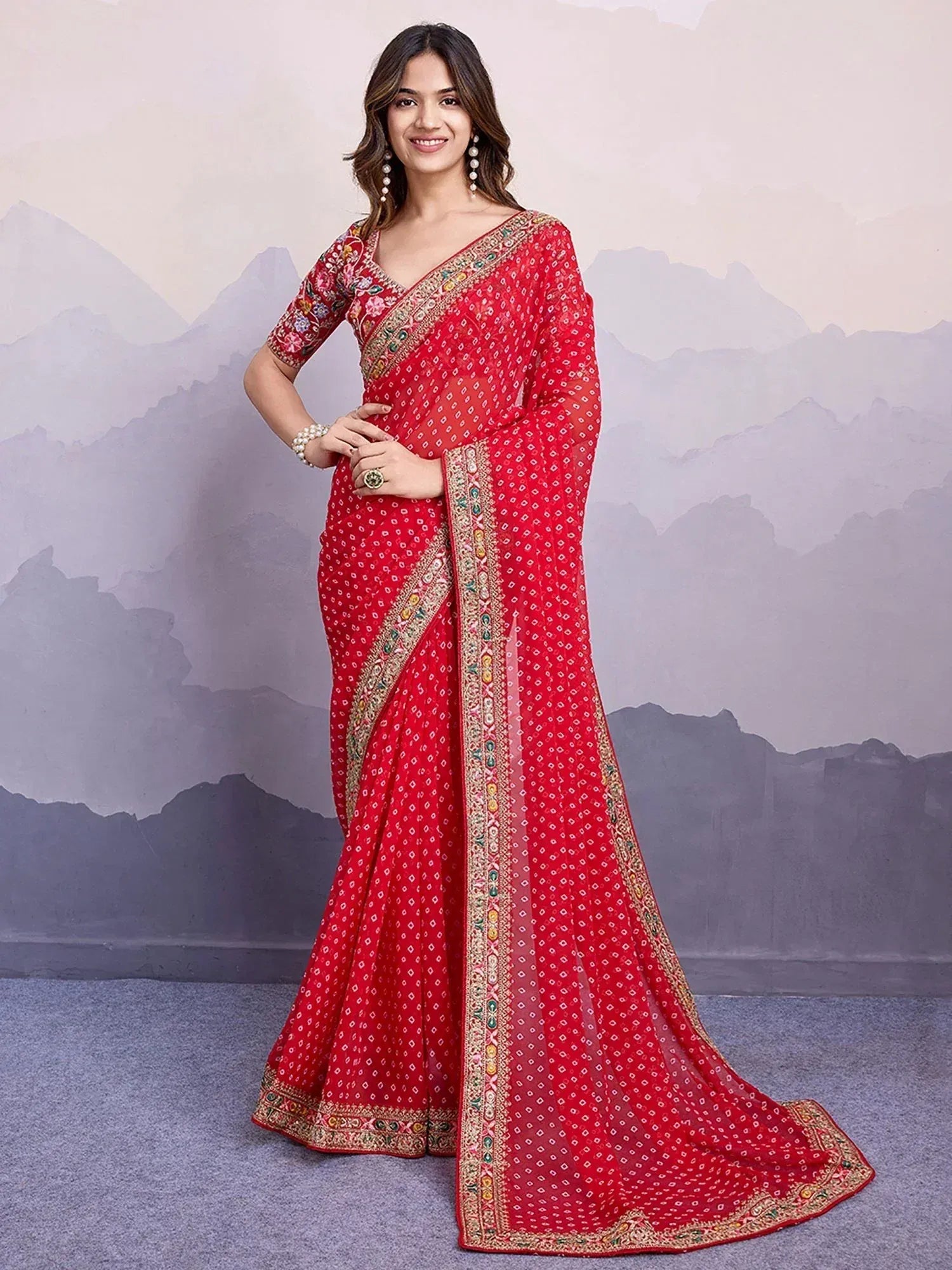 Red embroidered saree with floral blouse, perfect for Indian ethnic wear occasions