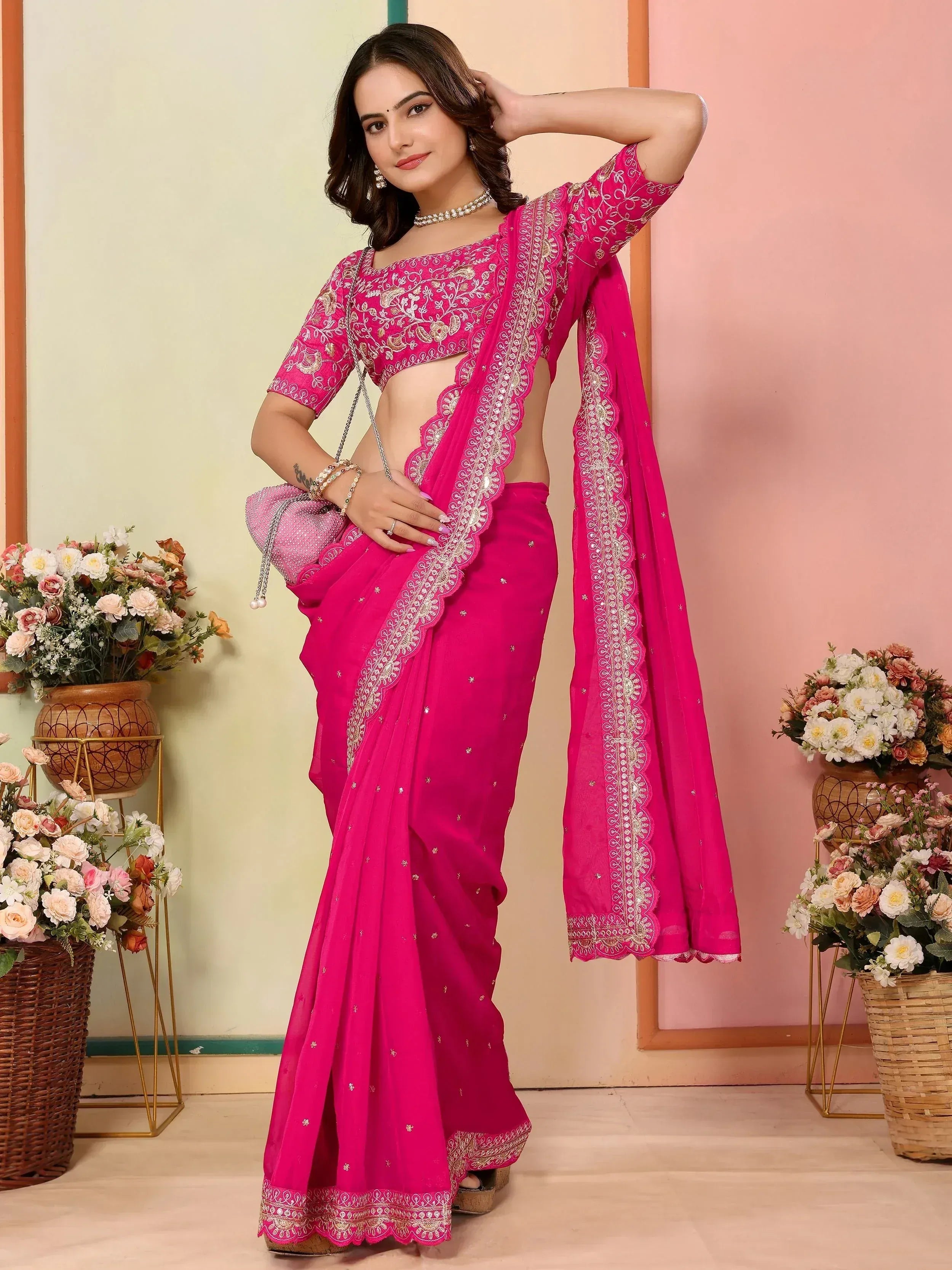 Vibrant pink embroidered saree with matching blouse and dupatta, perfect for Indian ethnic occasions