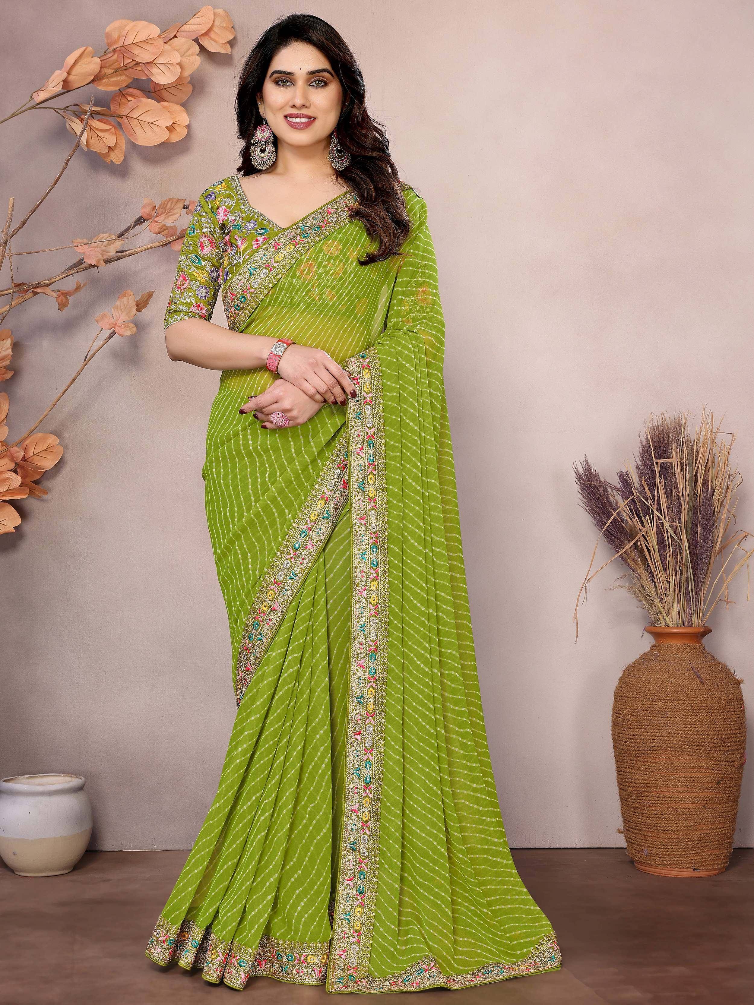 Green printed saree with floral embroidery and border, Indian ethnic wear for women