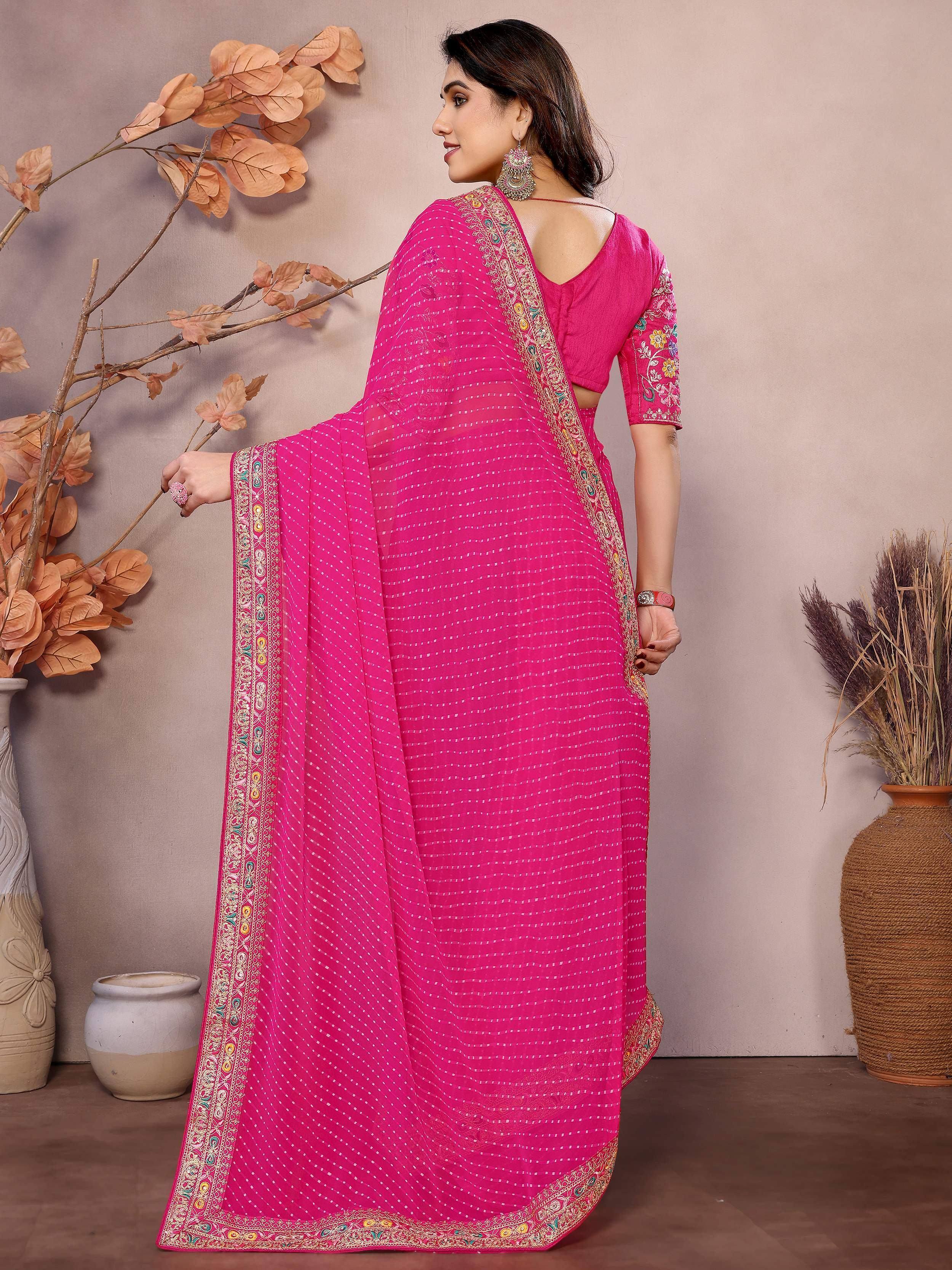 Pink embroidered saree with floral border, back view, Indian ethnic wear