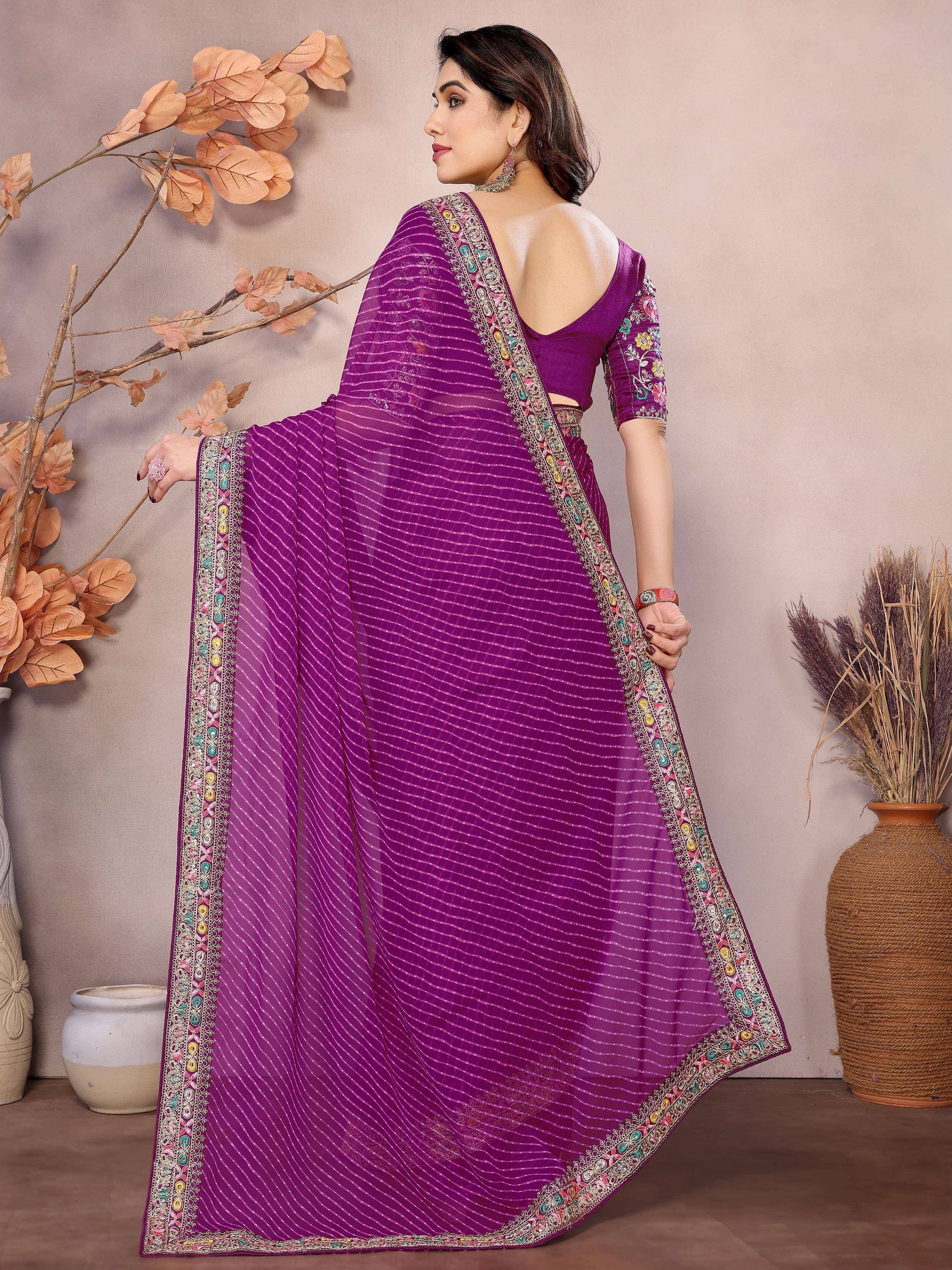 Purple embroidered saree with floral border, perfect for Indian ethnic wear occasions
