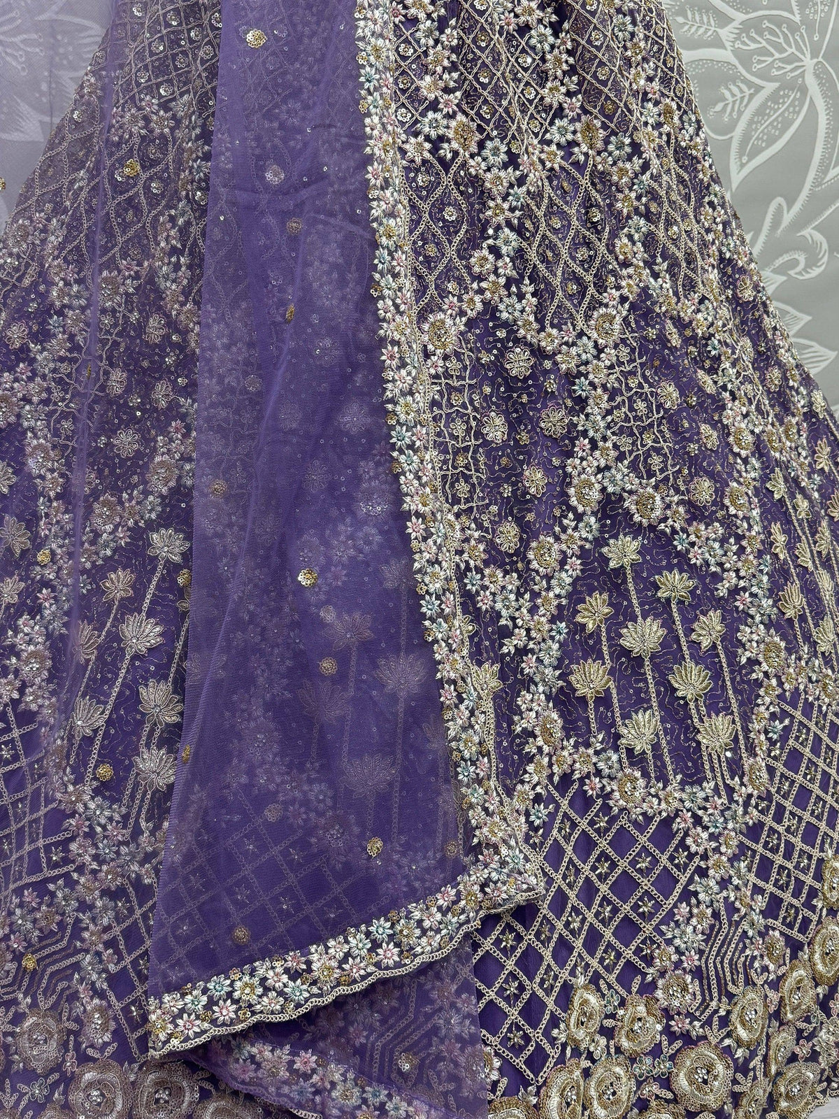 Purple embroidered lehenga with floral zari work and matching dupatta