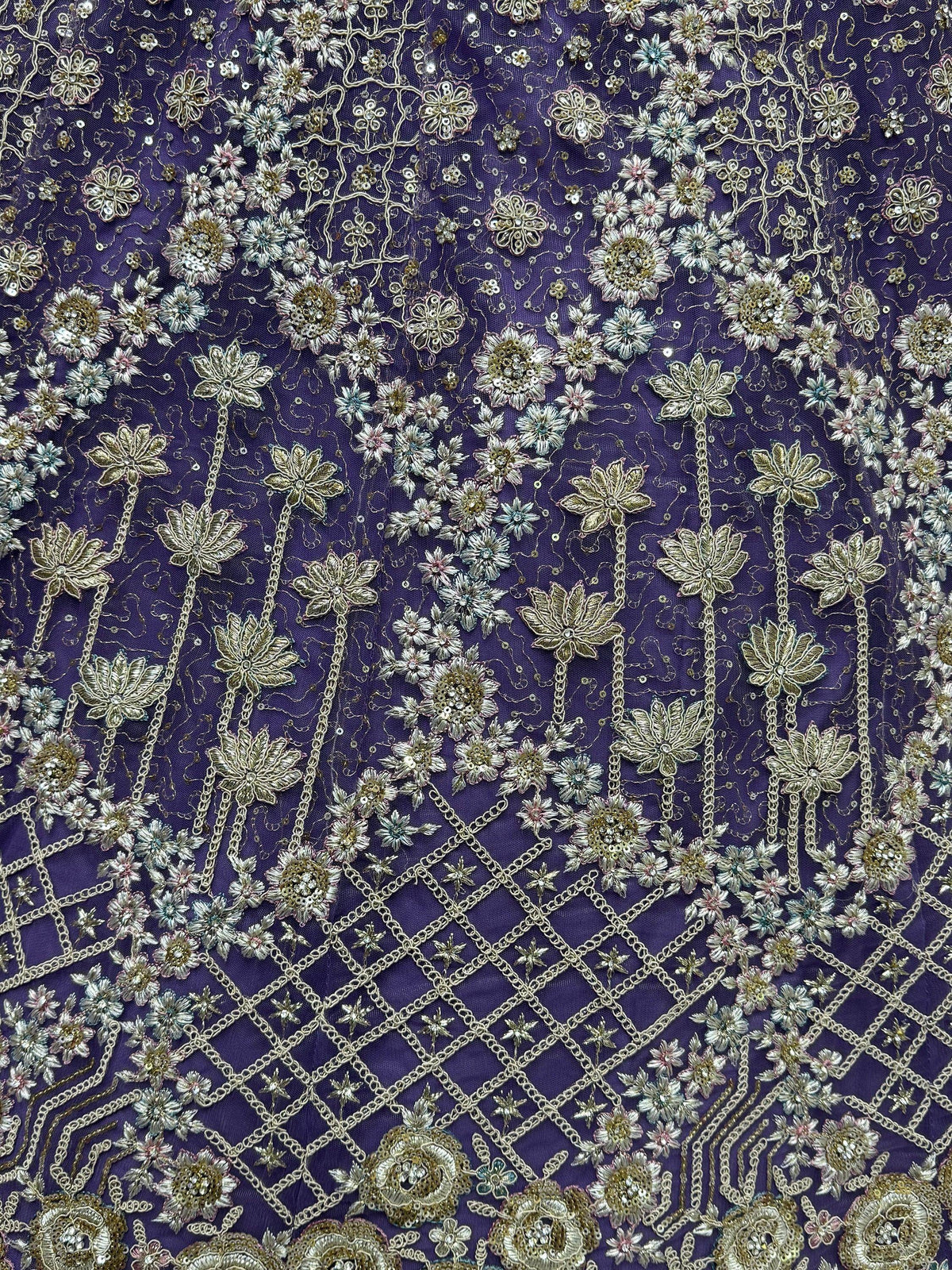 Purple ethnic wear fabric with gold floral embroidery and sequin detailing for designer lehenga or saree