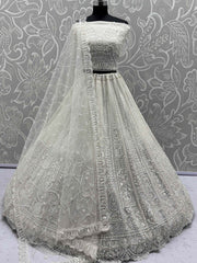 Gleaming White Sequins Net Engagement Wear Lehenga Choli With Dupatta