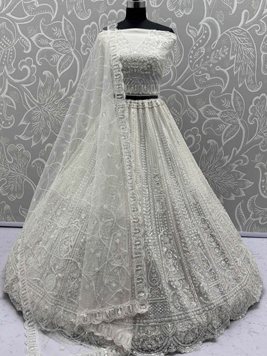 Gleaming White Sequins Net Engagement Wear Lehenga Choli With Dupatta