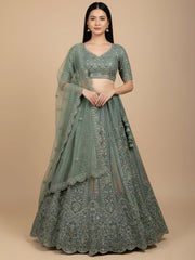 Tantalizing Green Sequins Net Engagement Wear Lehenga Choli With Dupatta