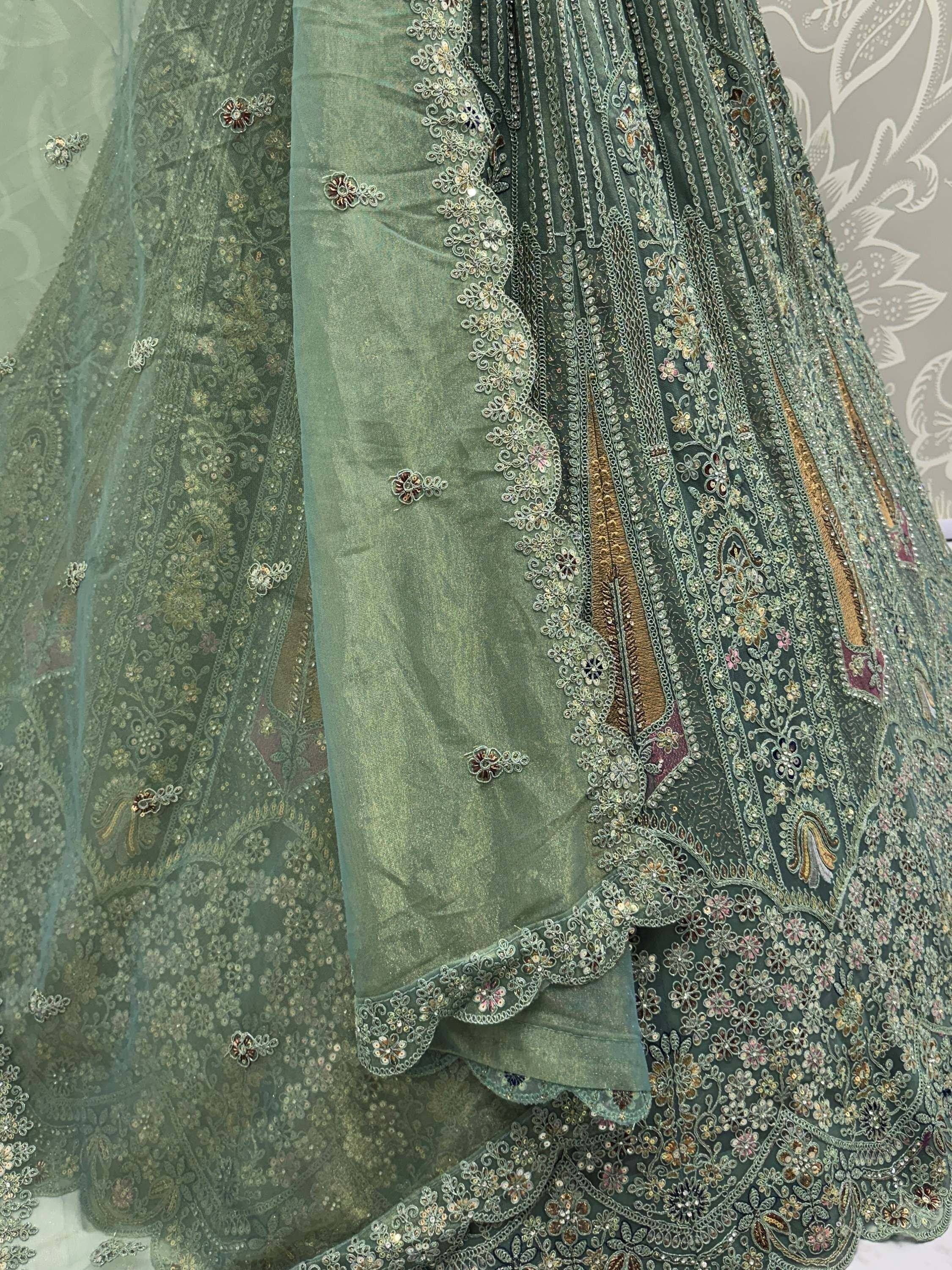 Sage green designer lehenga choli with intricate floral embroidery and sequin detailing for Indian ethnic wear