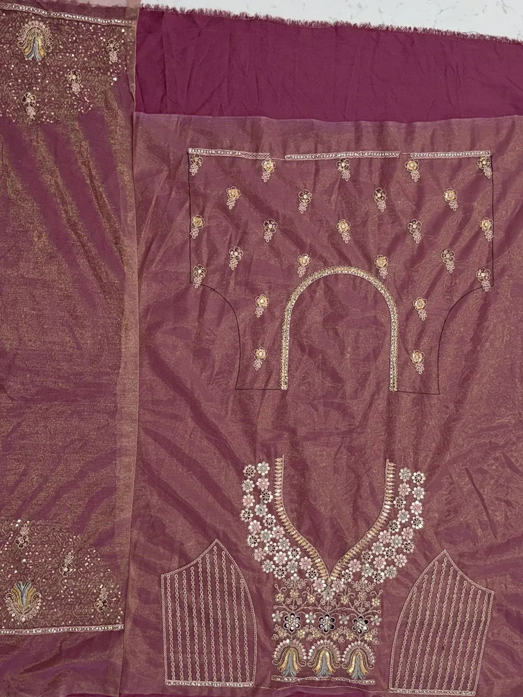 Purple embroidered ethnic salwar kameez with floral zari work and matching dupatta, ideal for Indian occasions