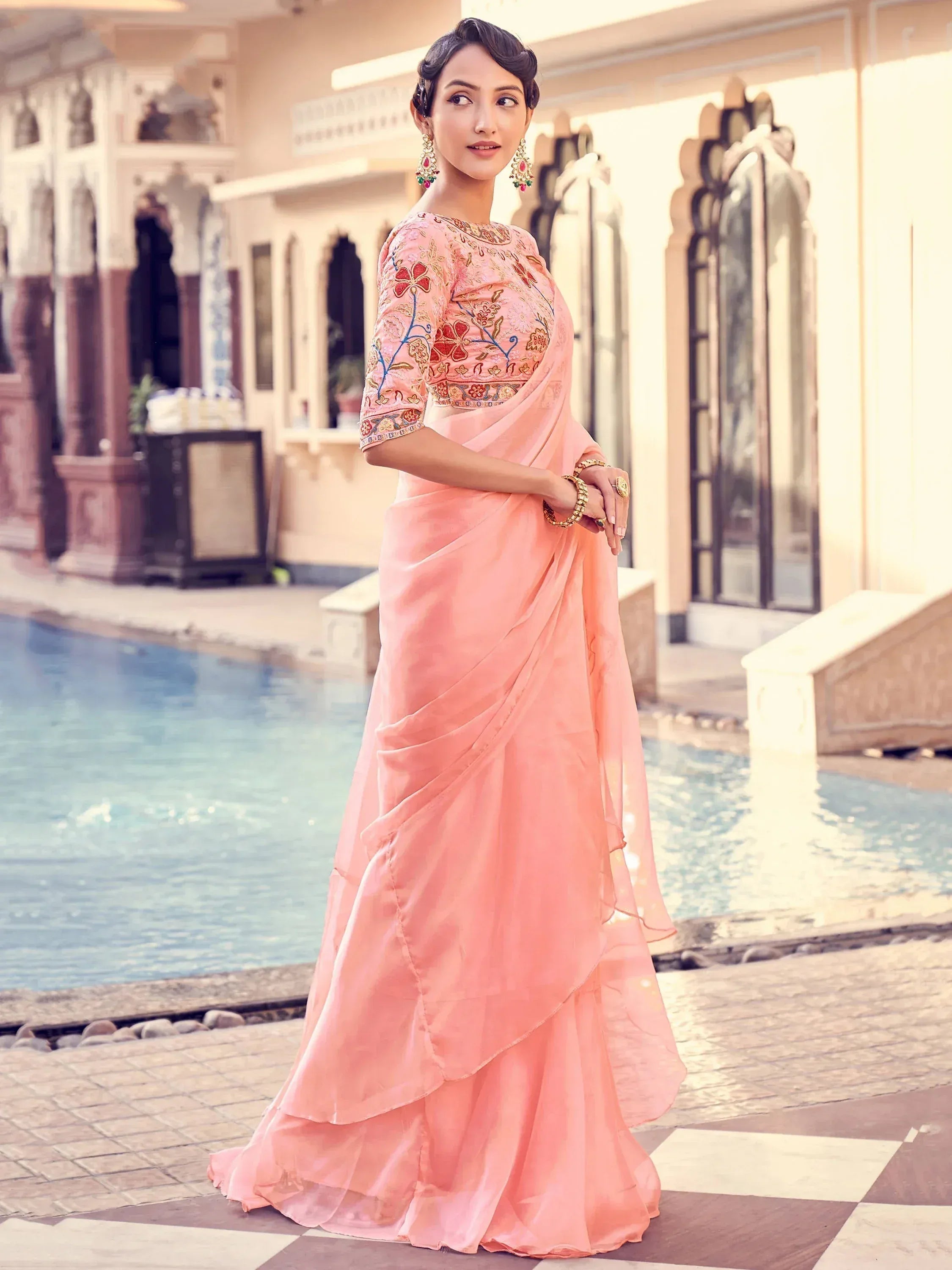 Pink embroidered saree with floral blouse, perfect for Indian ethnic occasions