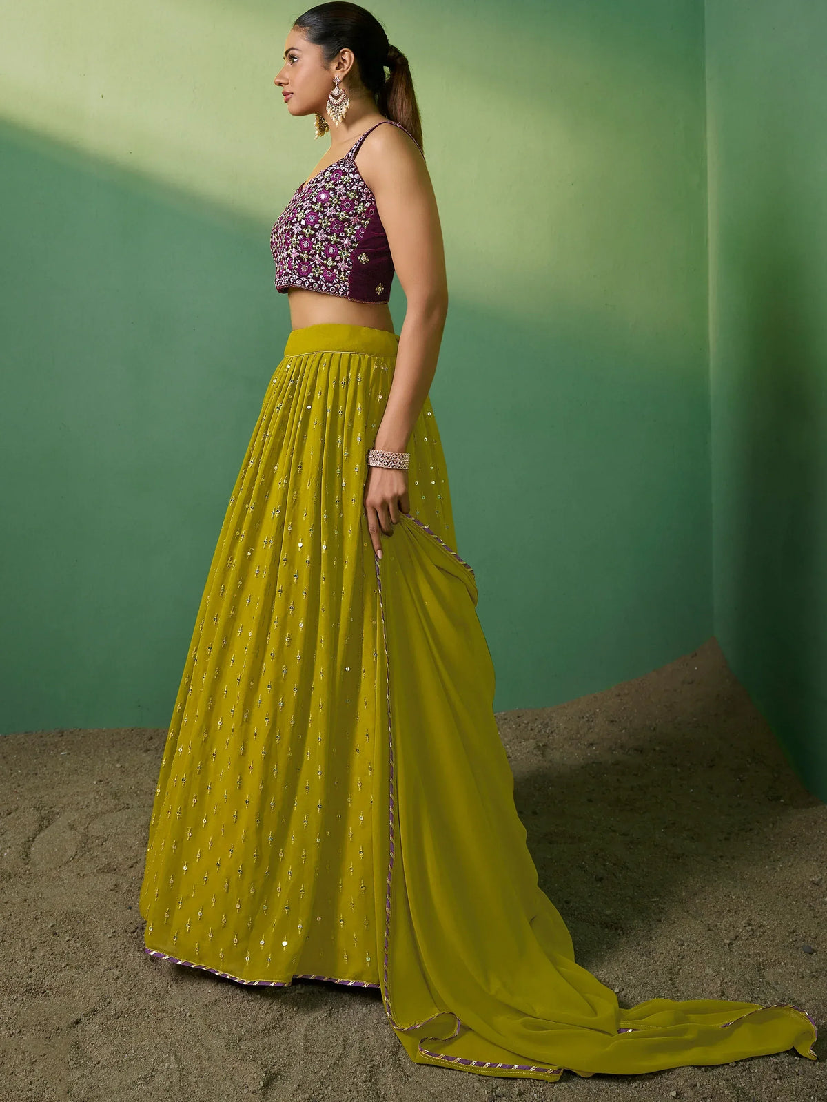 Elegant yellow lehenga with purple embroidered blouse, perfect for Indian ethnic occasions