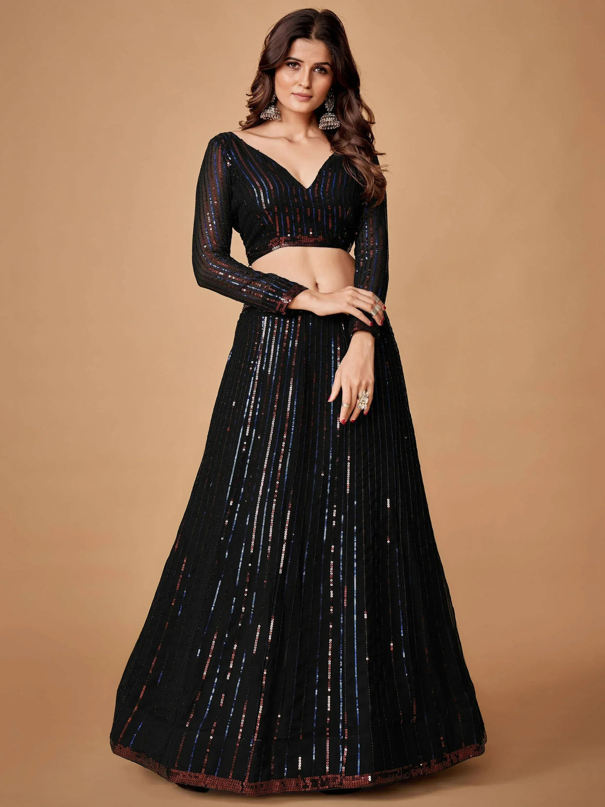 Black sequin lehenga choli with V-neck blouse, perfect for Indian ethnic wear and festive occasions.