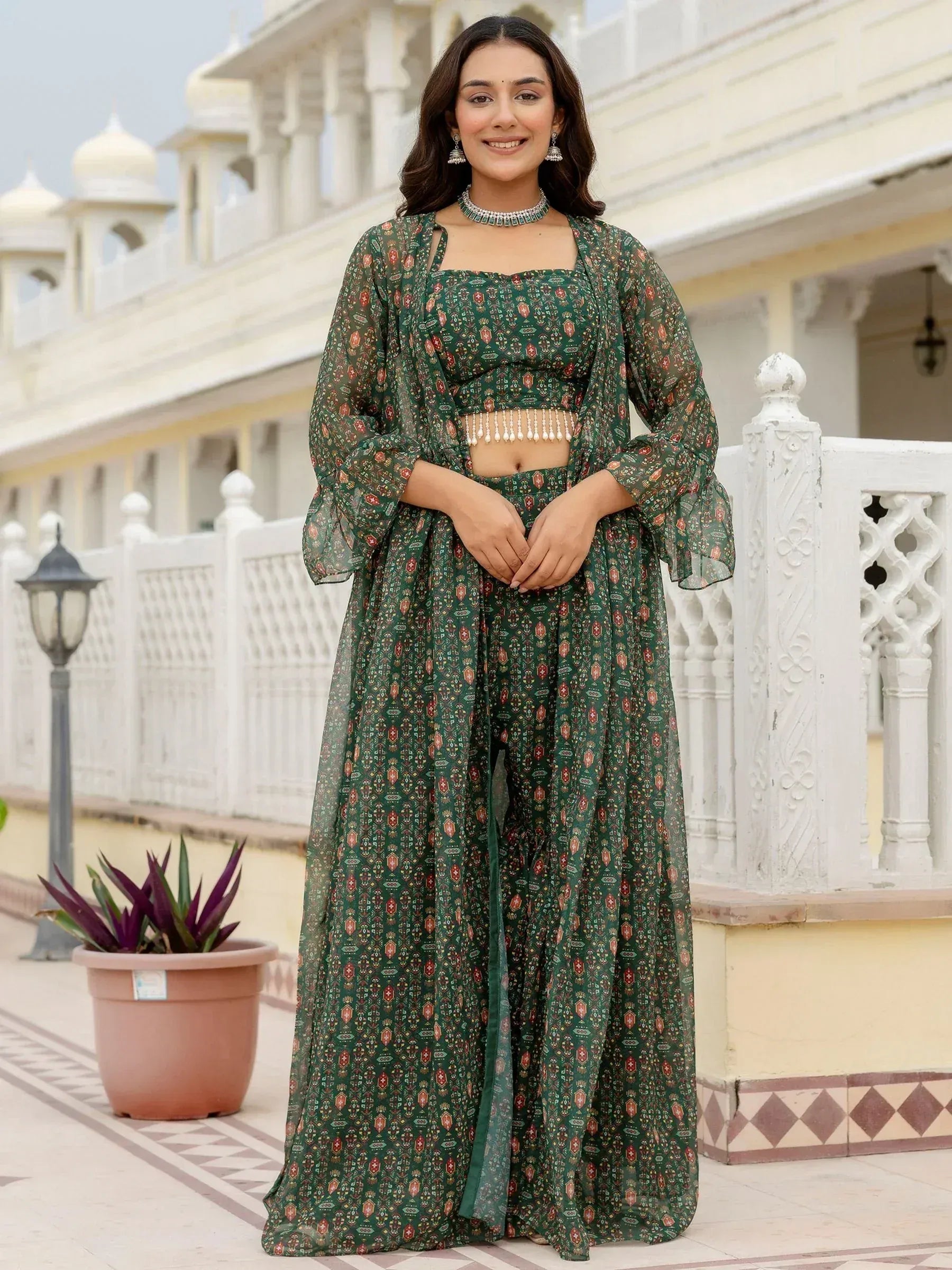 Green printed ethnic palazzo set with sheer cape, perfect for Indian occasions and festive wear.
