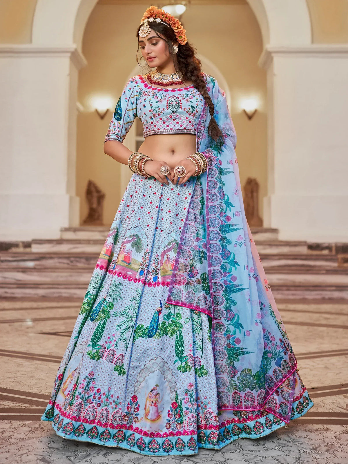 Blue floral printed lehenga choli with peacock motifs, perfect for Indian weddings and festive occasions