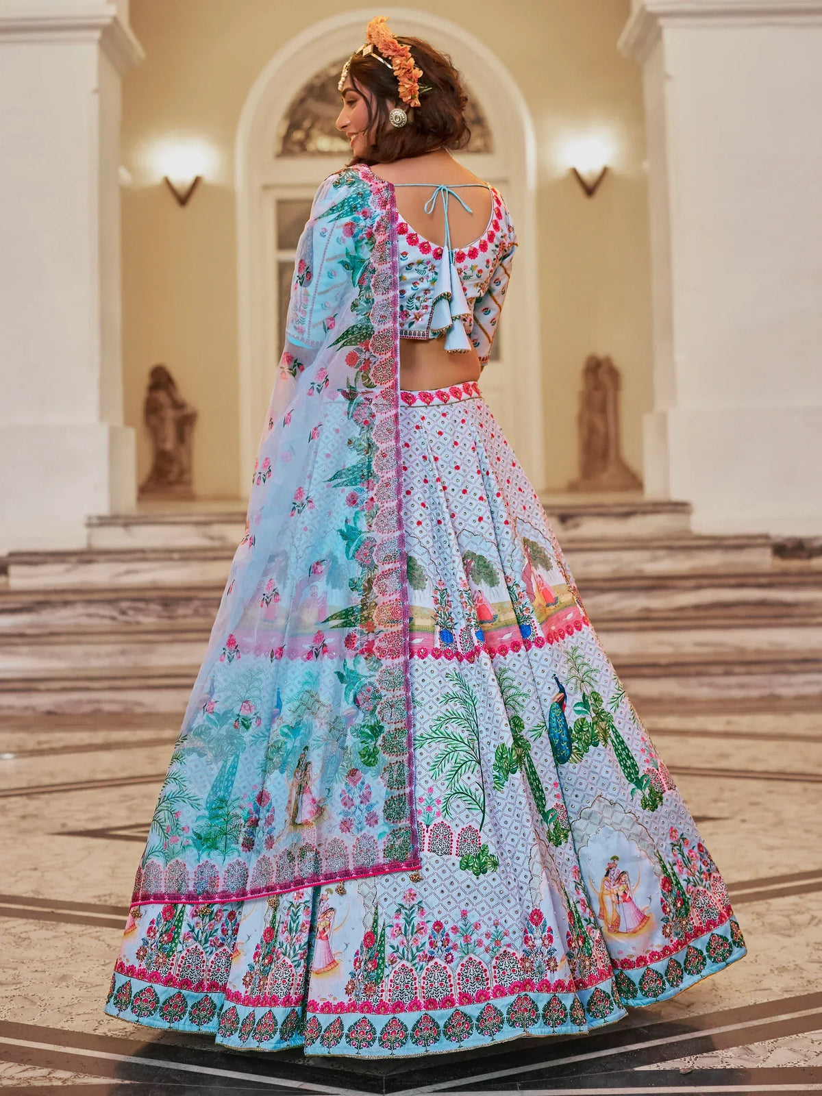 Woman in floral printed lehenga choli with peacock motifs, perfect for Indian ethnic wear occasions