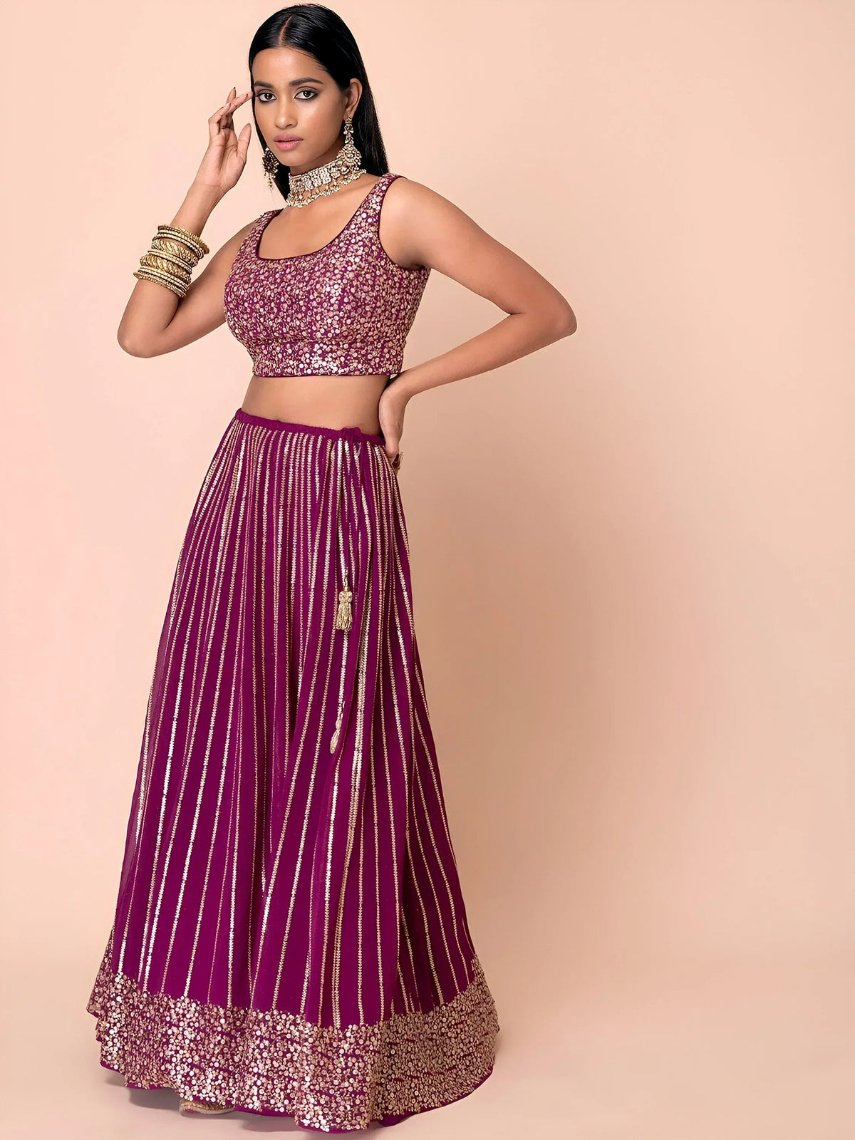 Purple sequin lehenga choli with gold stripes, perfect for Indian ethnic wear and festive occasions