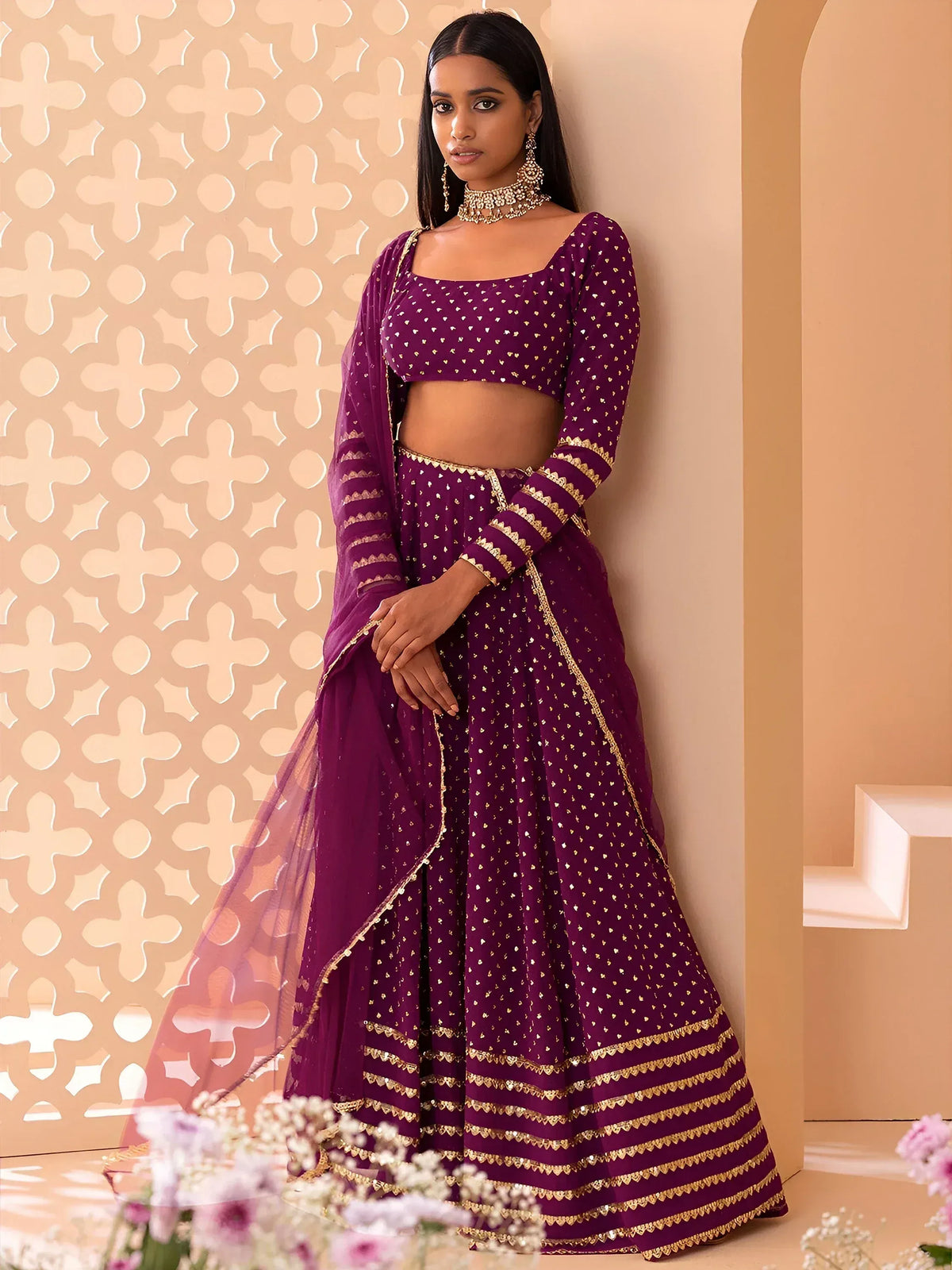 Purple designer lehenga choli with gold embroidery, perfect for Indian ethnic wear occasions