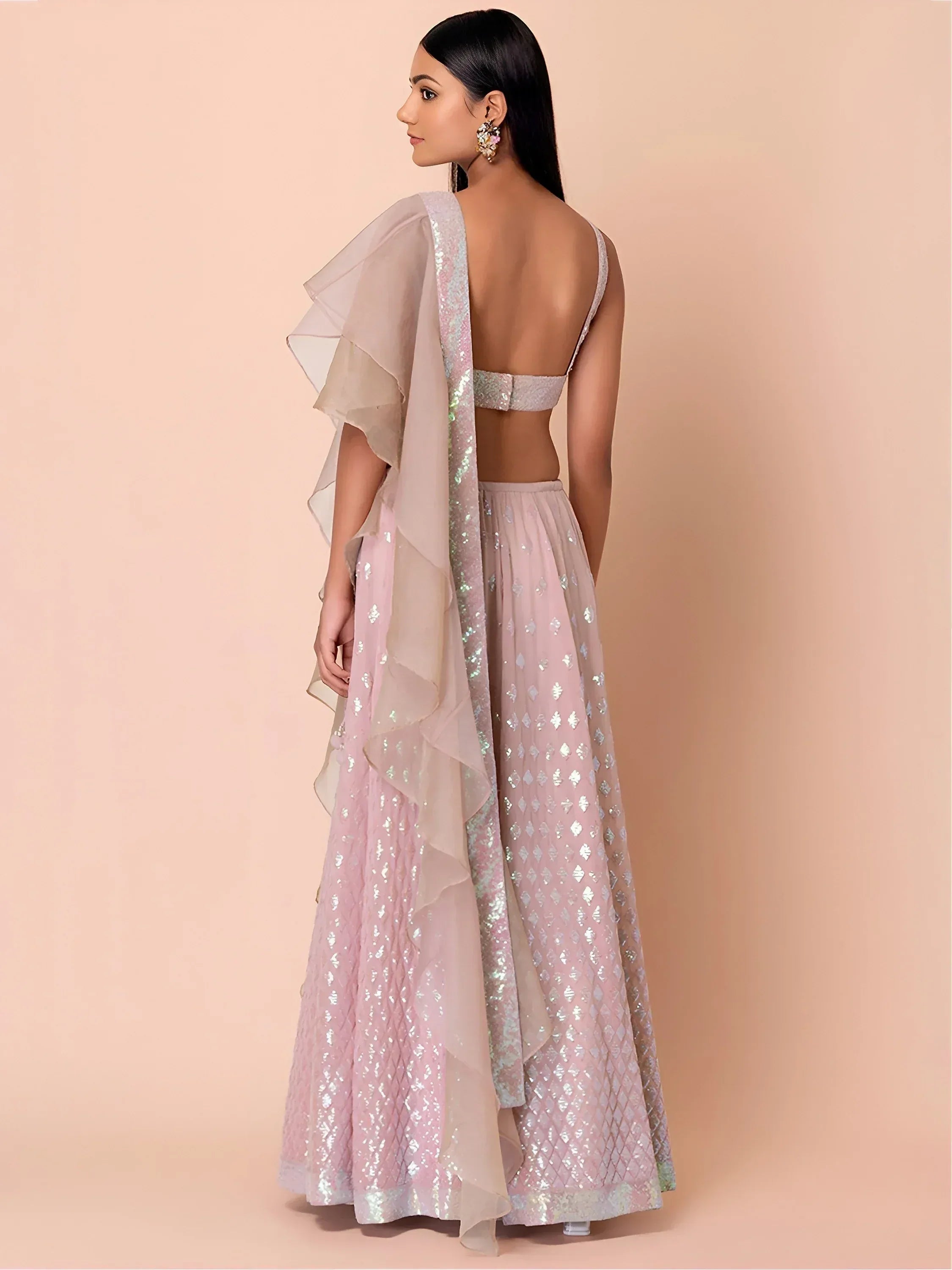 Pink sequin lehenga choli with ruffled dupatta, back view