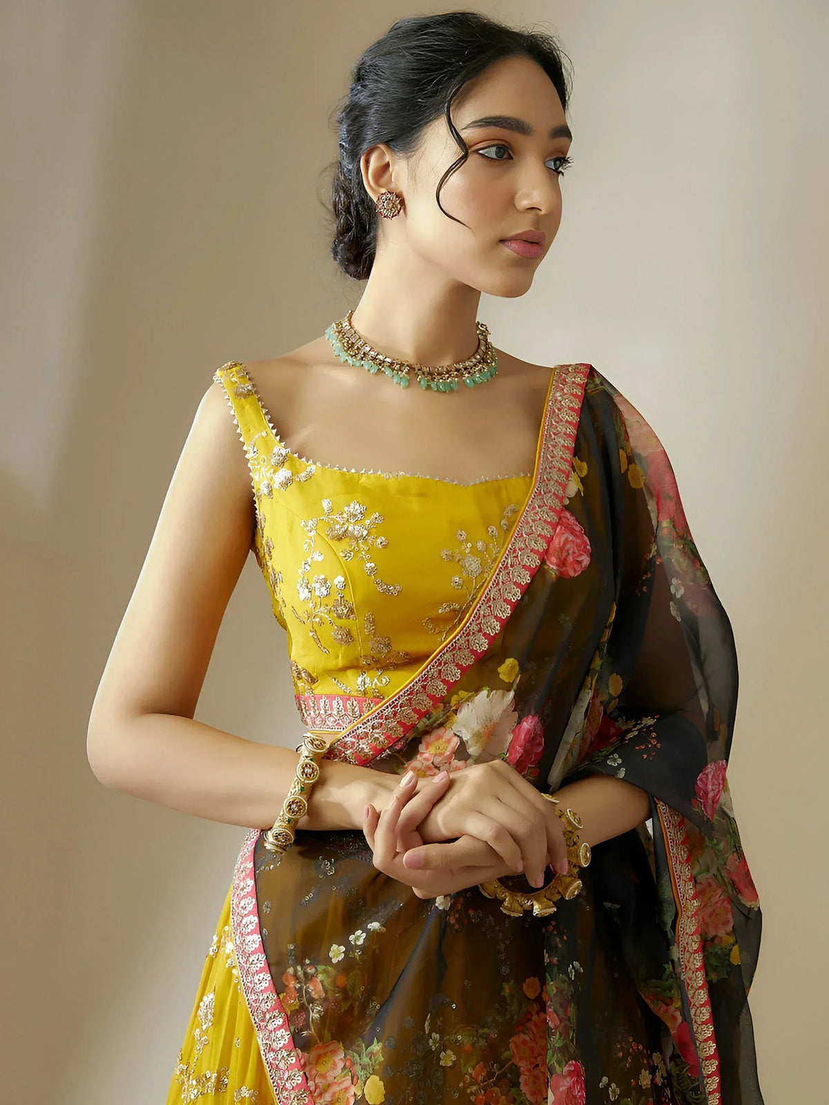 Yellow embroidered lehenga choli with floral dupatta, perfect for Indian ethnic wear occasions