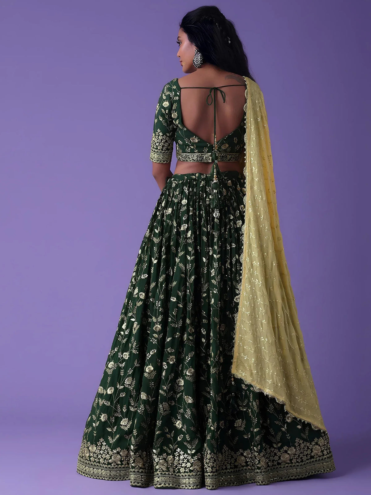 Green floral embroidered lehenga choli with yellow dupatta, back view