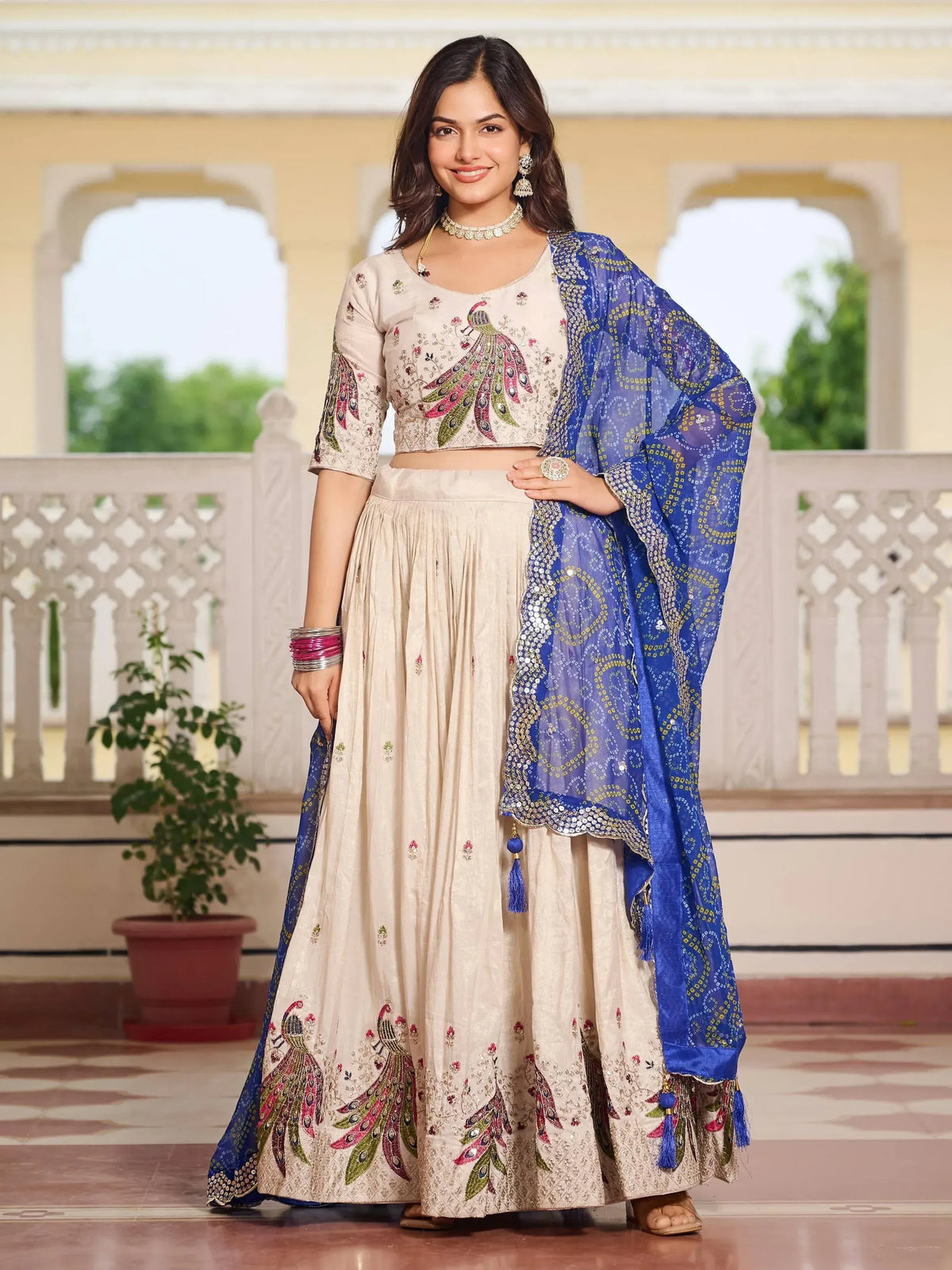 Beige peacock-embroidered lehenga choli with blue dupatta, Indian ethnic wear for women