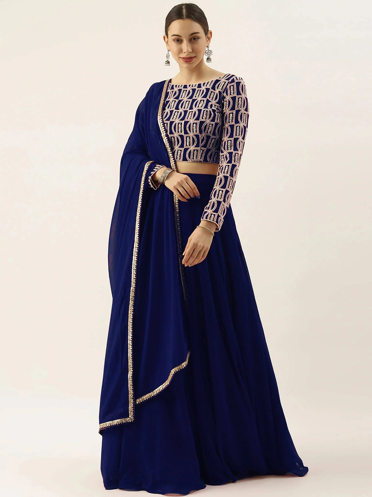 Royal blue embroidered lehenga choli with gold detailing, perfect for Indian ethnic wear occasions.