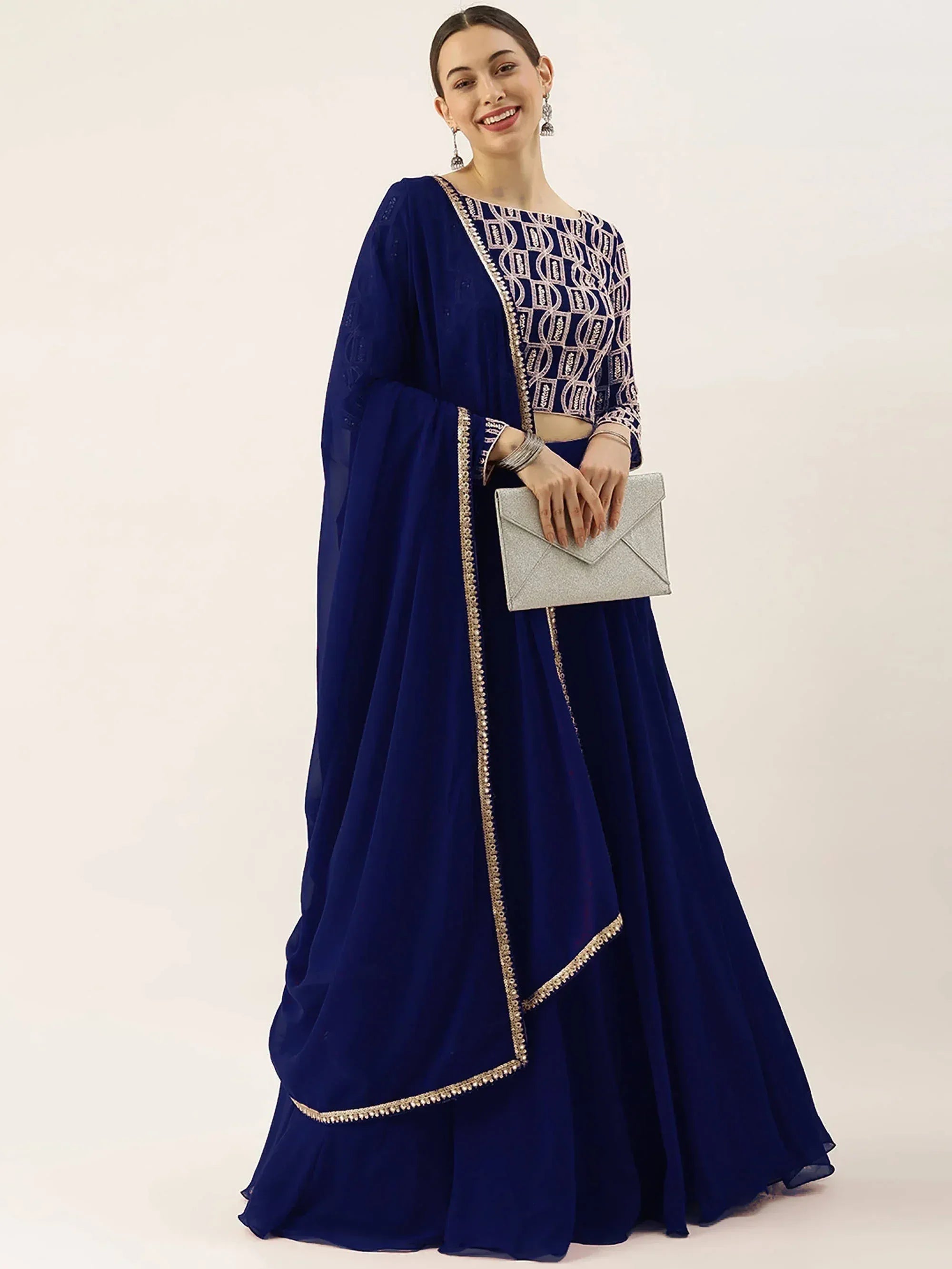 Royal blue embroidered lehenga choli with gold detailing, perfect for Indian ethnic wear occasions
