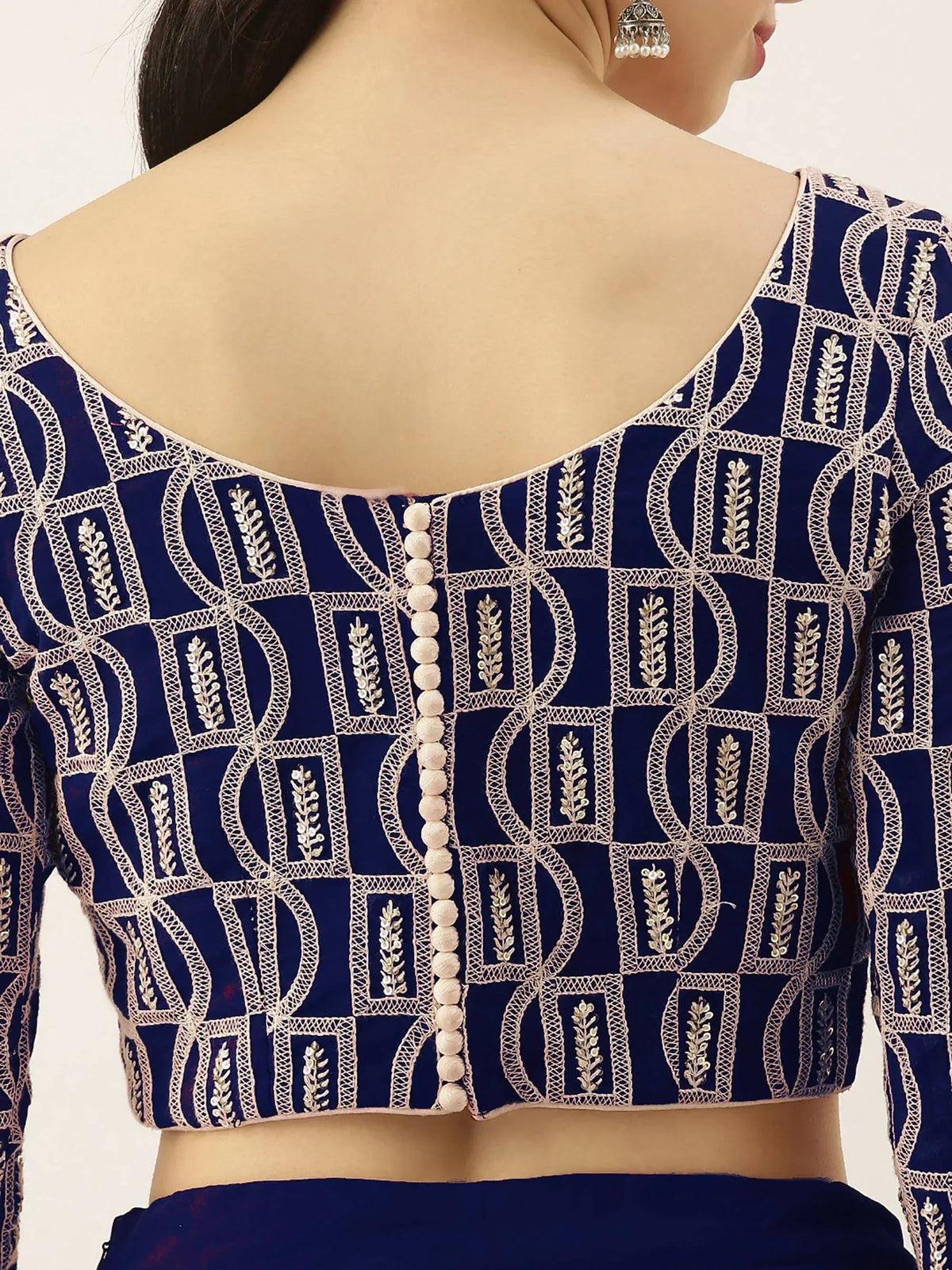 Navy blue embroidered blouse with geometric patterns and pearl buttons, perfect for Indian ethnic wear