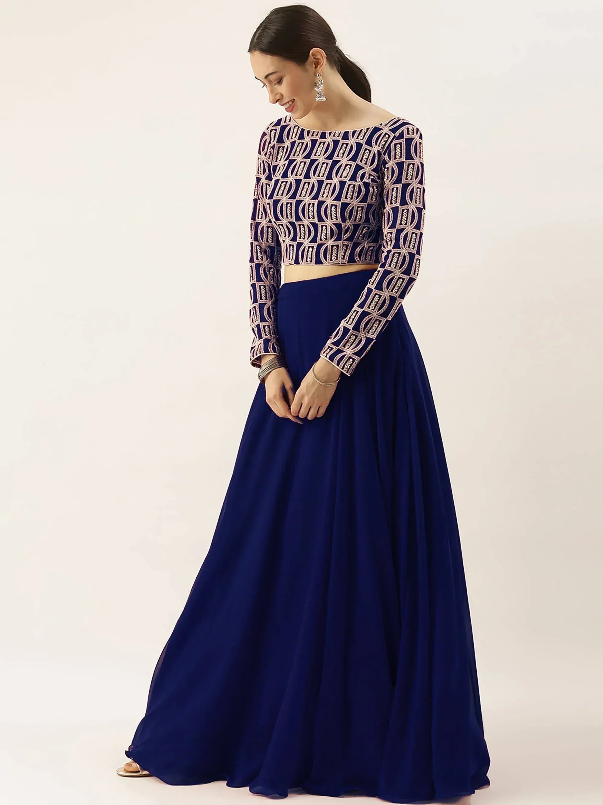 Royal blue embroidered lehenga choli with geometric pattern, perfect for Indian ethnic wear events