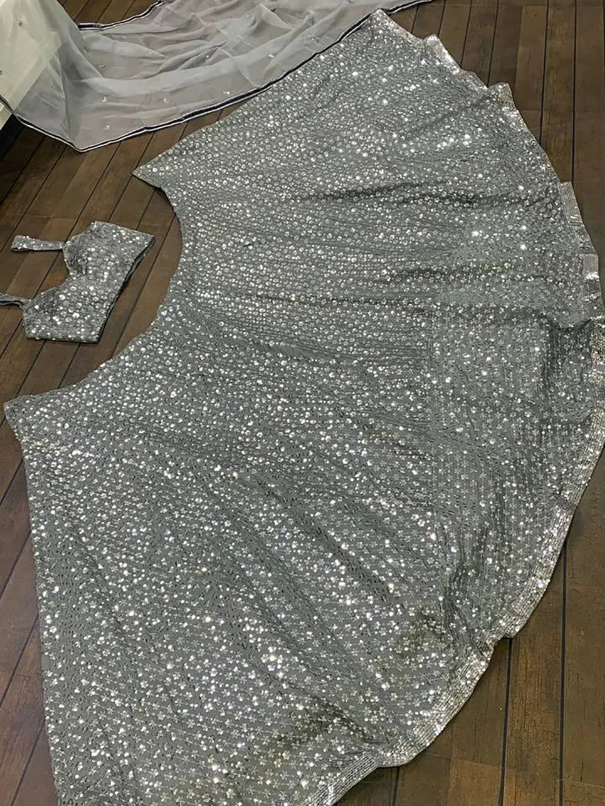 Fascinating Grey Sequins Silk Reception Wear Lehenga Choli