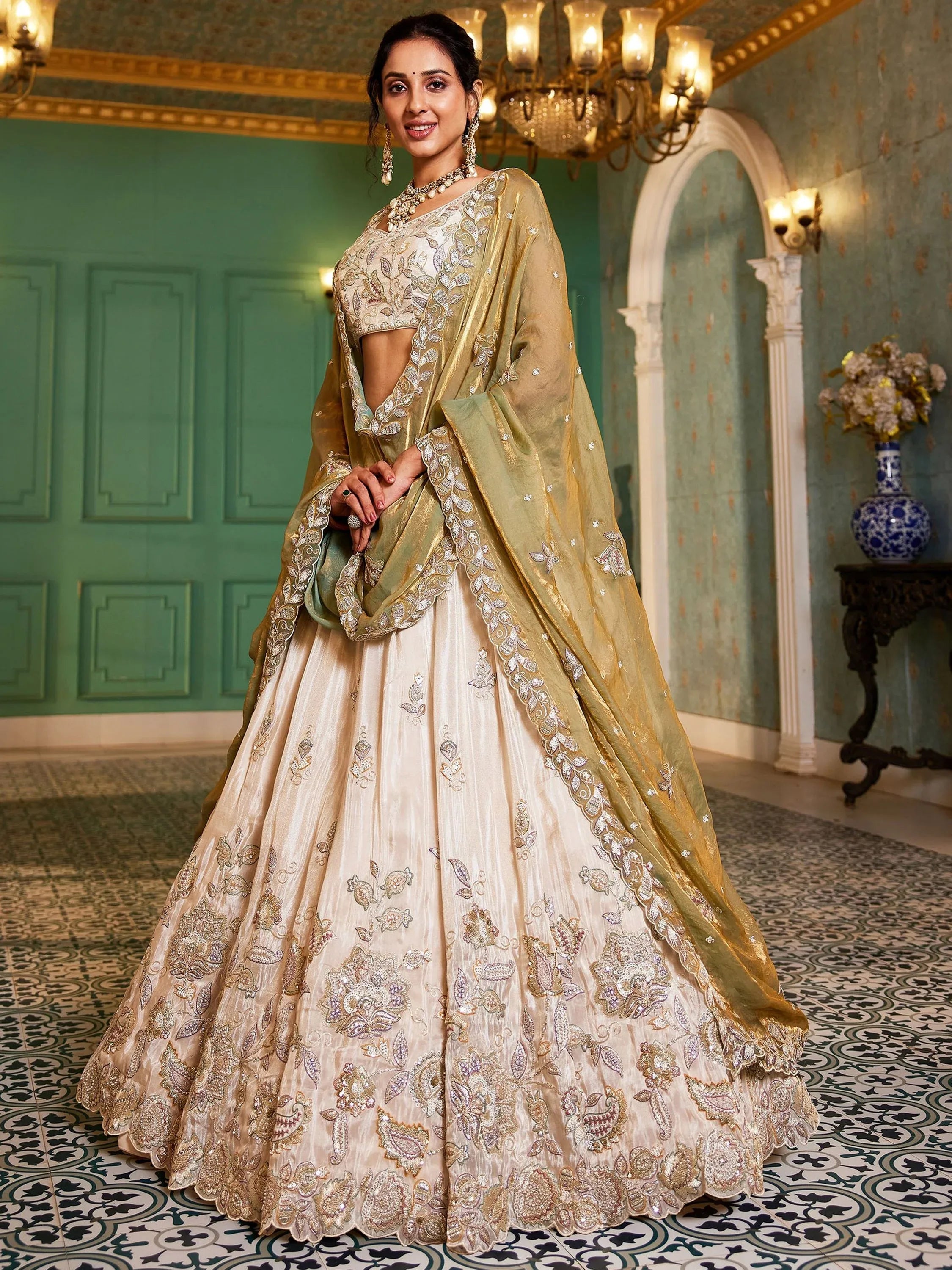 Stunning Cream Zari Embroidered Tissue Engagement Wear Lehenga Choli