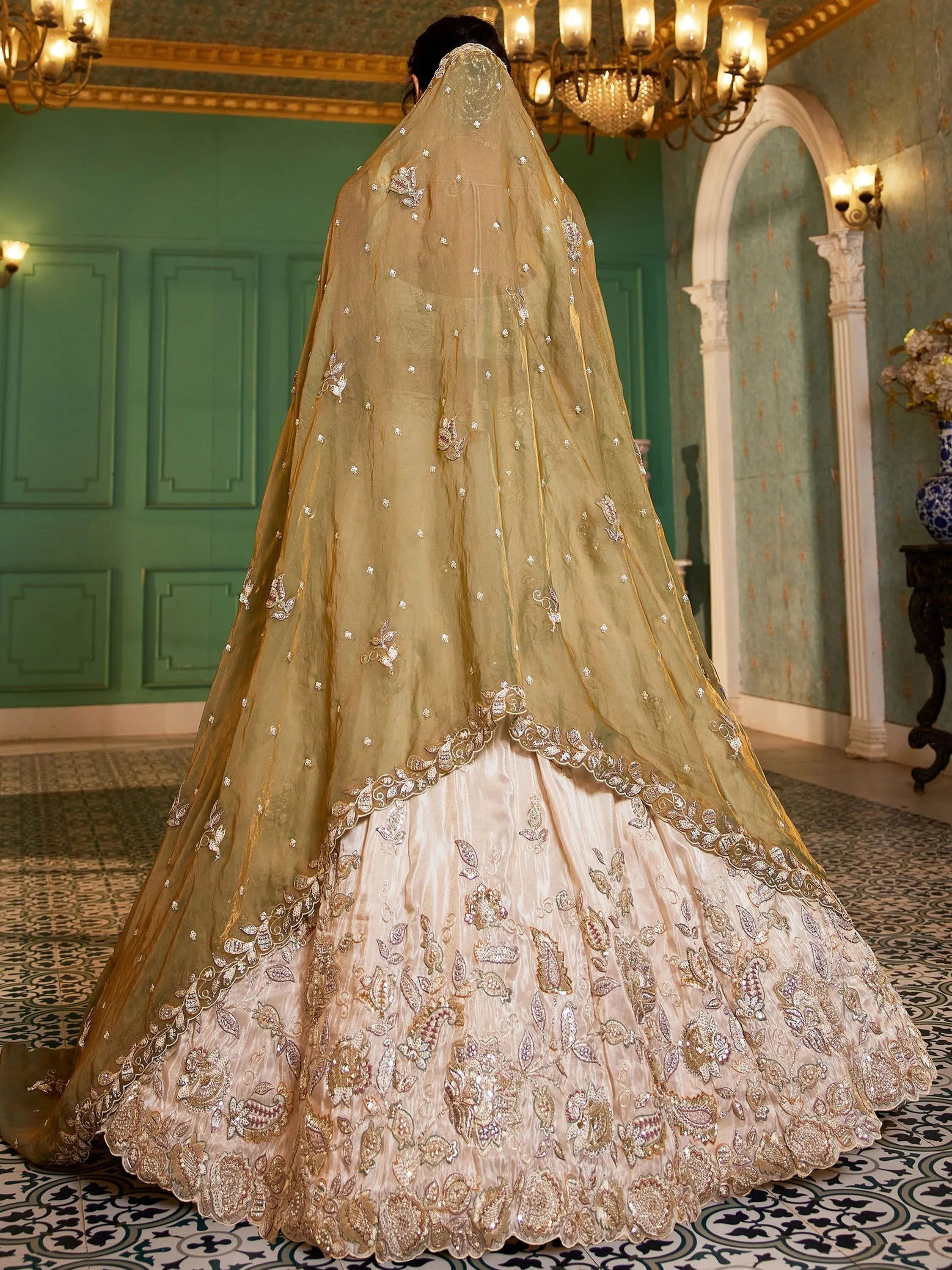 Stunning Cream Zari Embroidered Tissue Engagement Wear Lehenga Choli