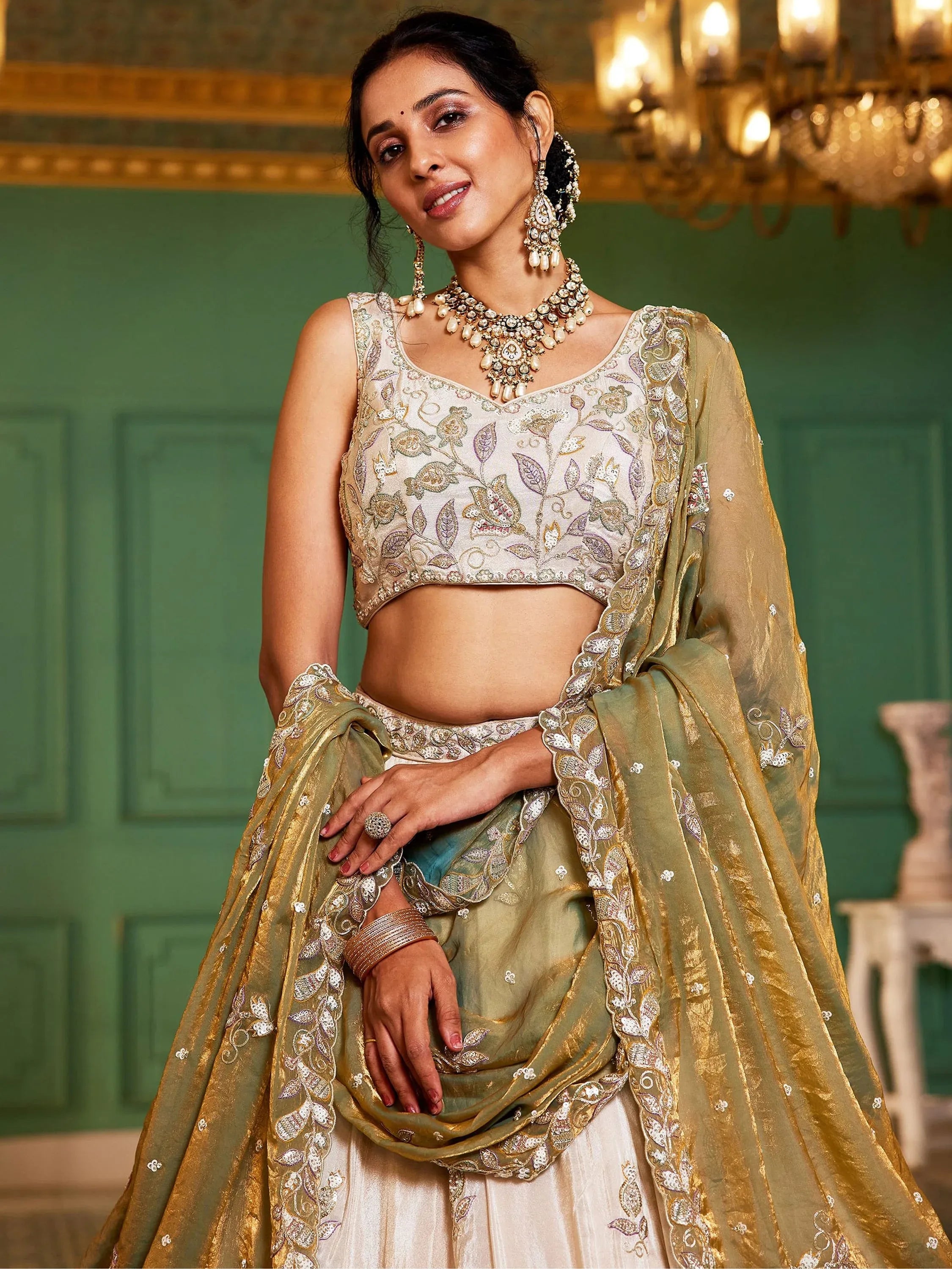Stunning Cream Zari Embroidered Tissue Engagement Wear Lehenga Choli