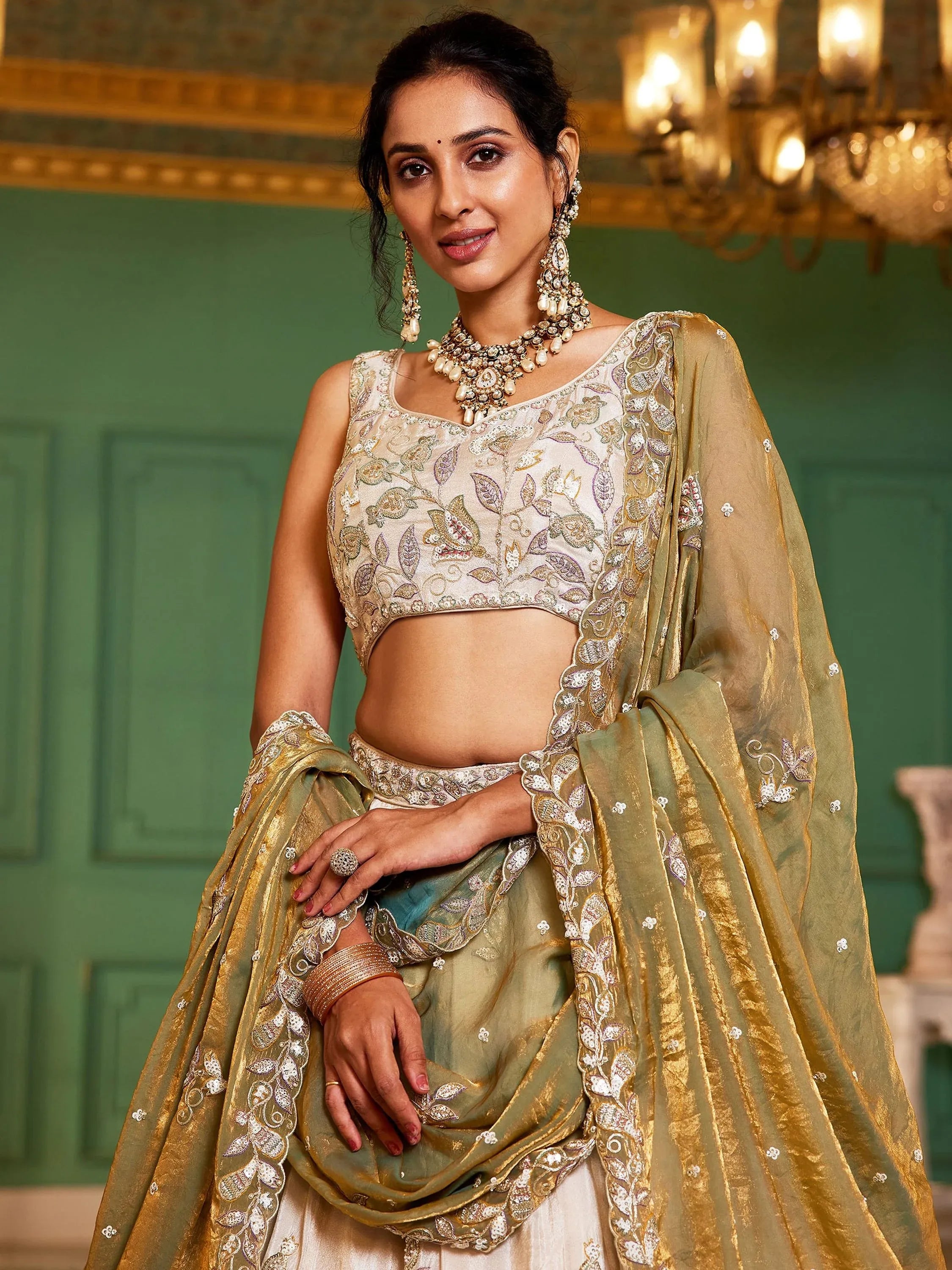 Stunning Cream Zari Embroidered Tissue Engagement Wear Lehenga Choli