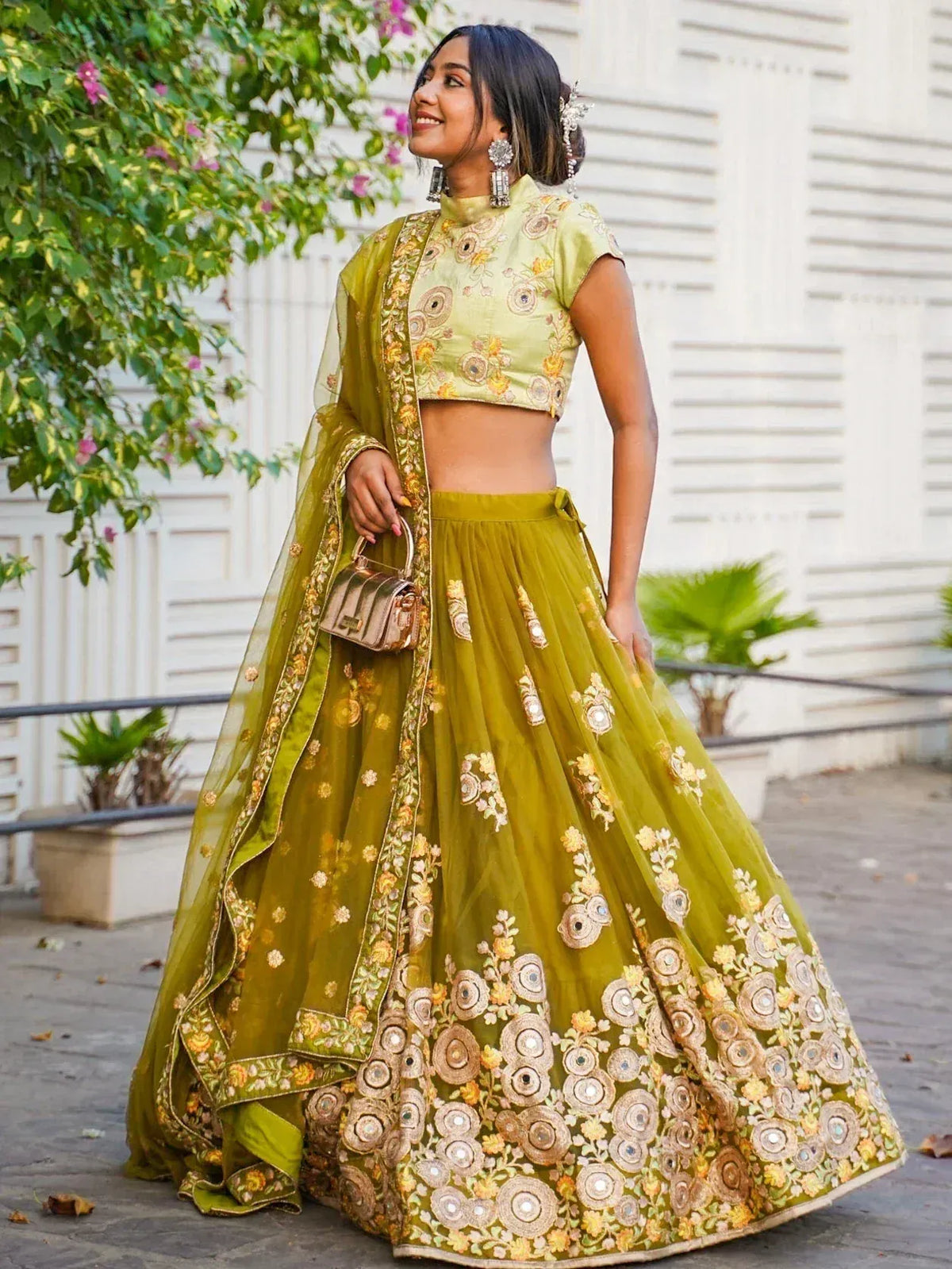 Olive green embroidered lehenga choli with floral motifs, perfect for Indian ethnic wear occasions