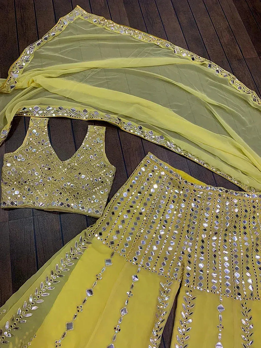 Yellow mirror-work ethnic lehenga choli with dupatta, designer Indian wear for festive occasions