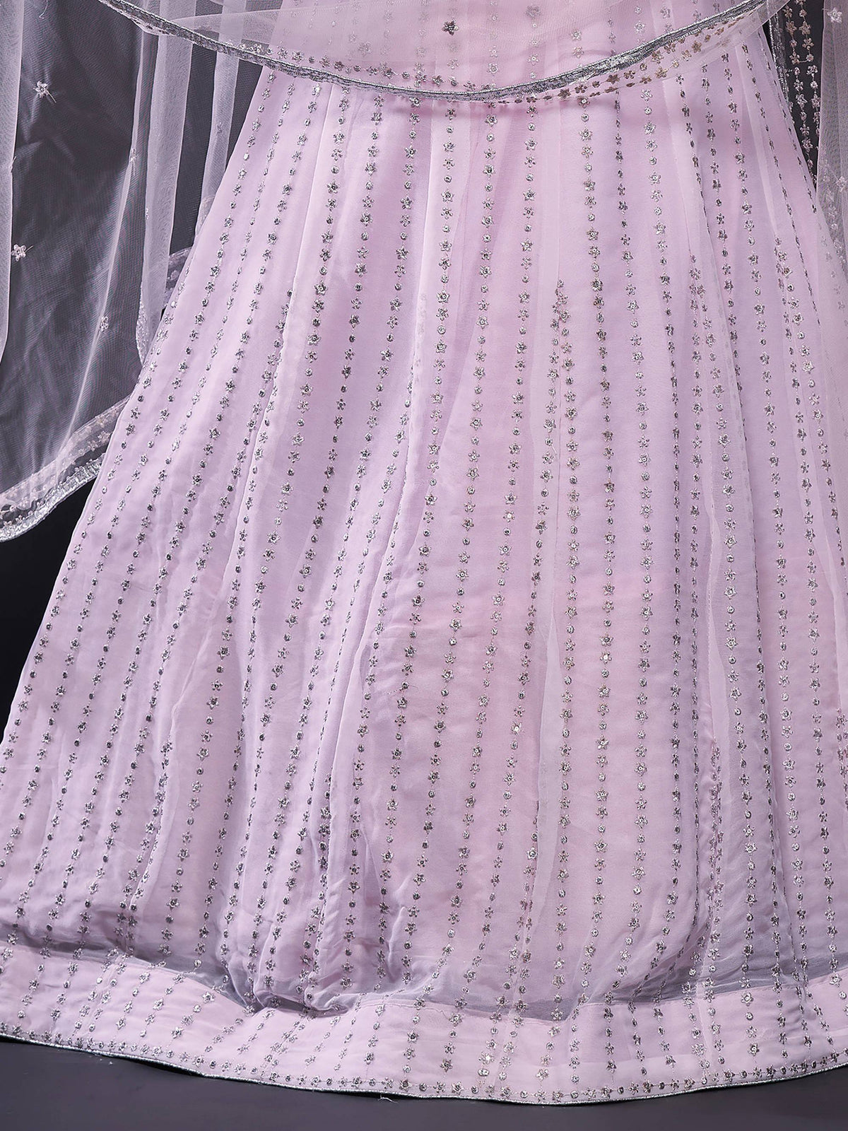Elegant lavender lehenga with floral silver embellishments and sheer dupatta