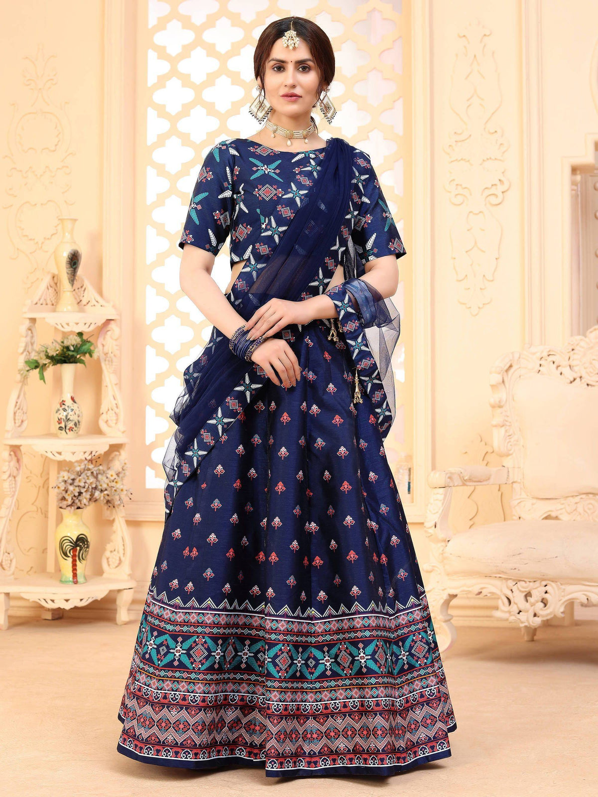 Navy blue printed lehenga choli with ethnic motifs and border, perfect for Indian weddings or festivals